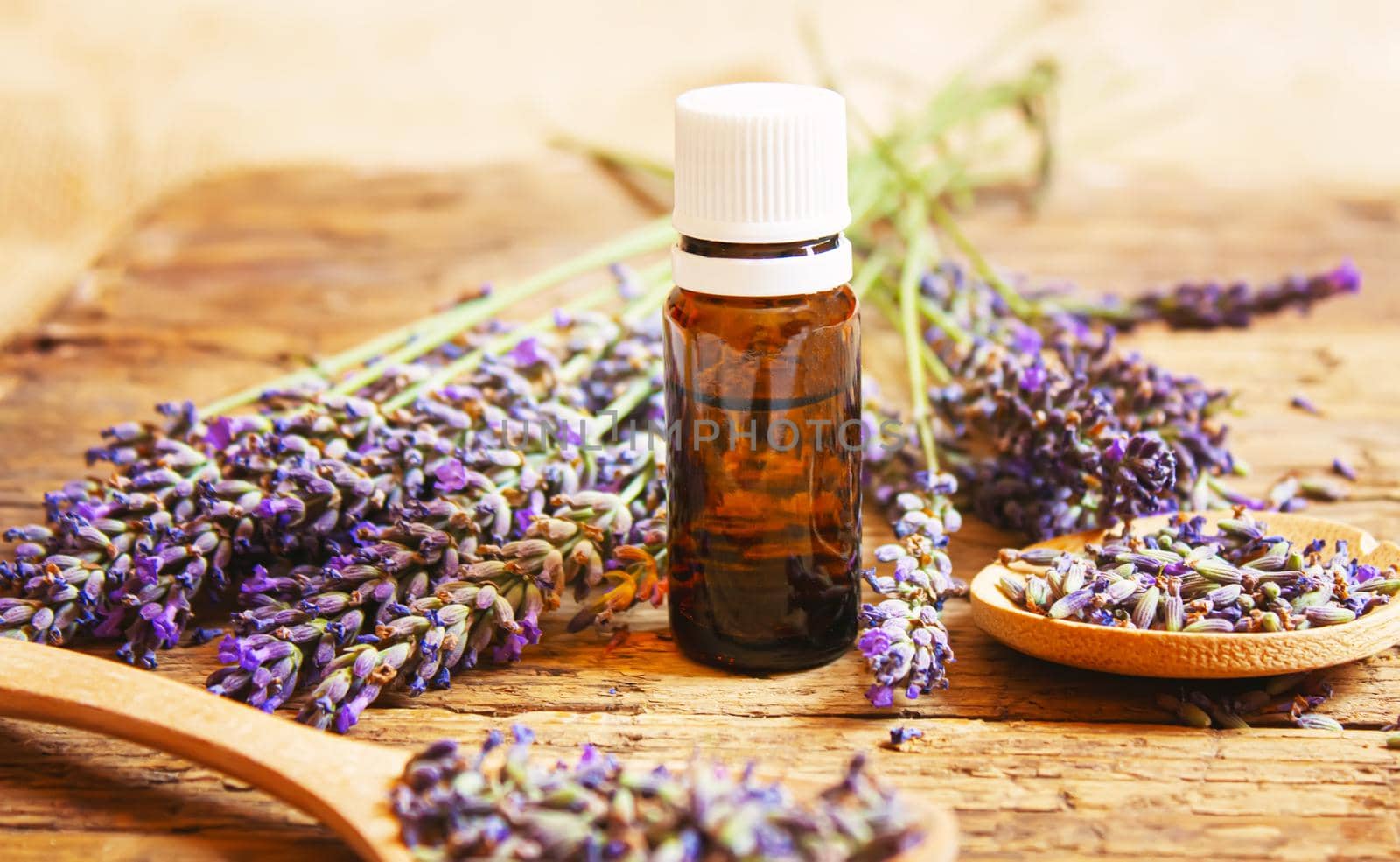 Lavender essential oil in a small bottle. Selective focus. nature.