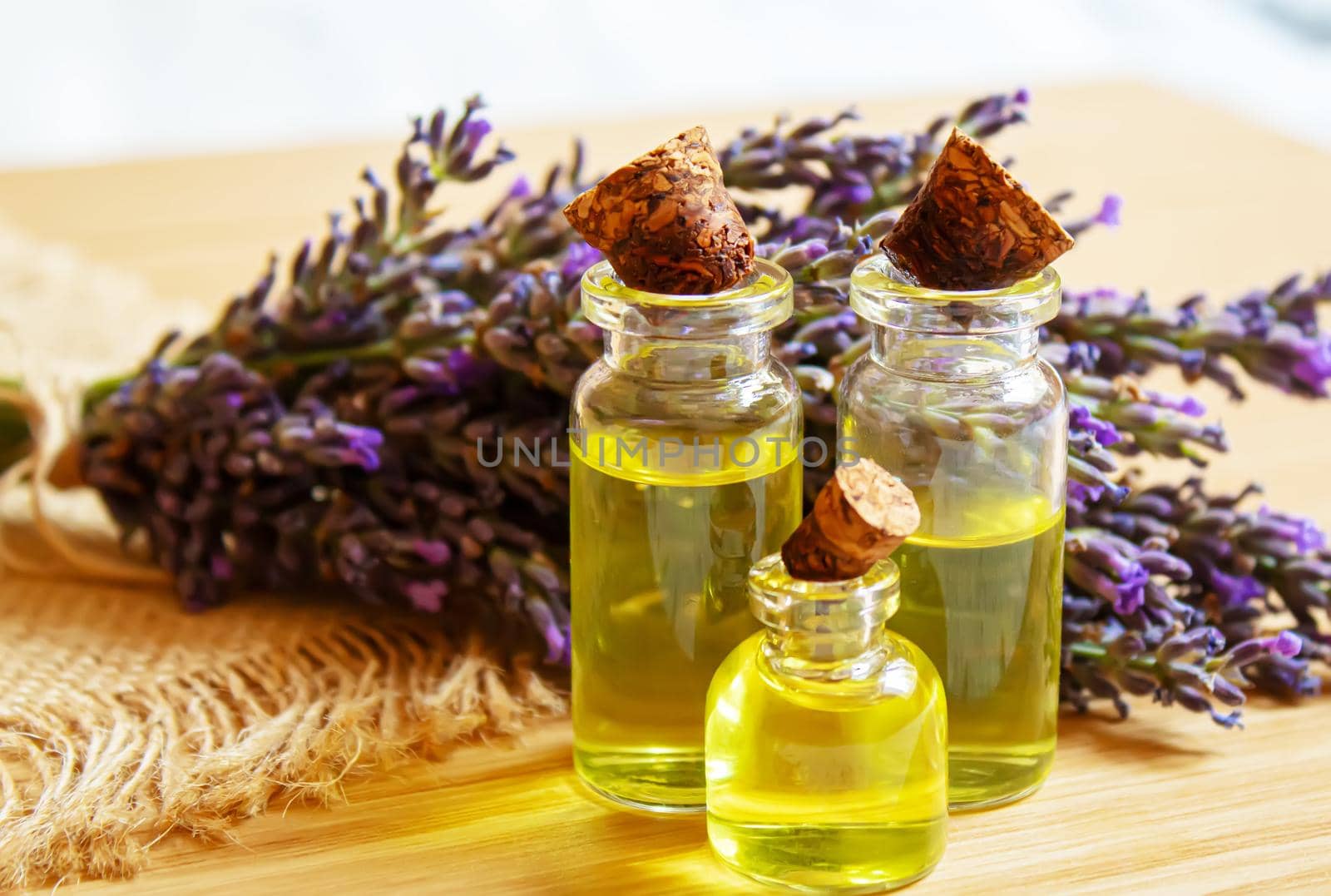 Lavender essential oil in a small bottle. Selective focus. nature.