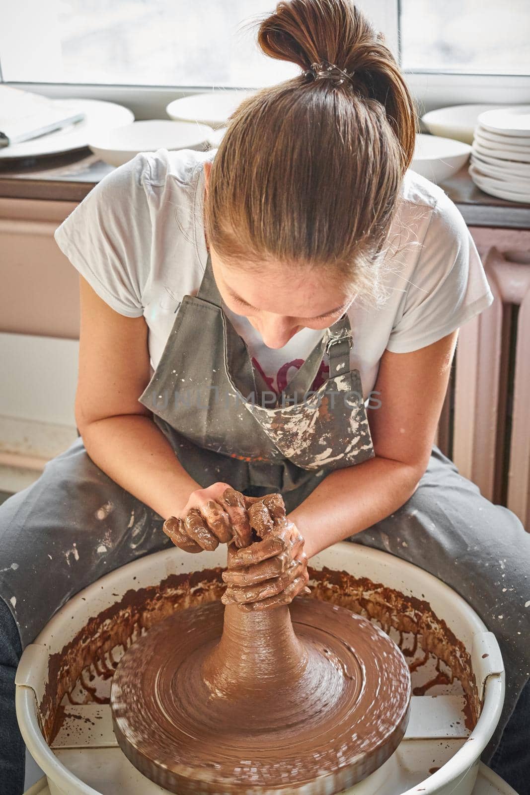 Woman freelance, business, hobby. Woman making ceramic pottery by NataBene