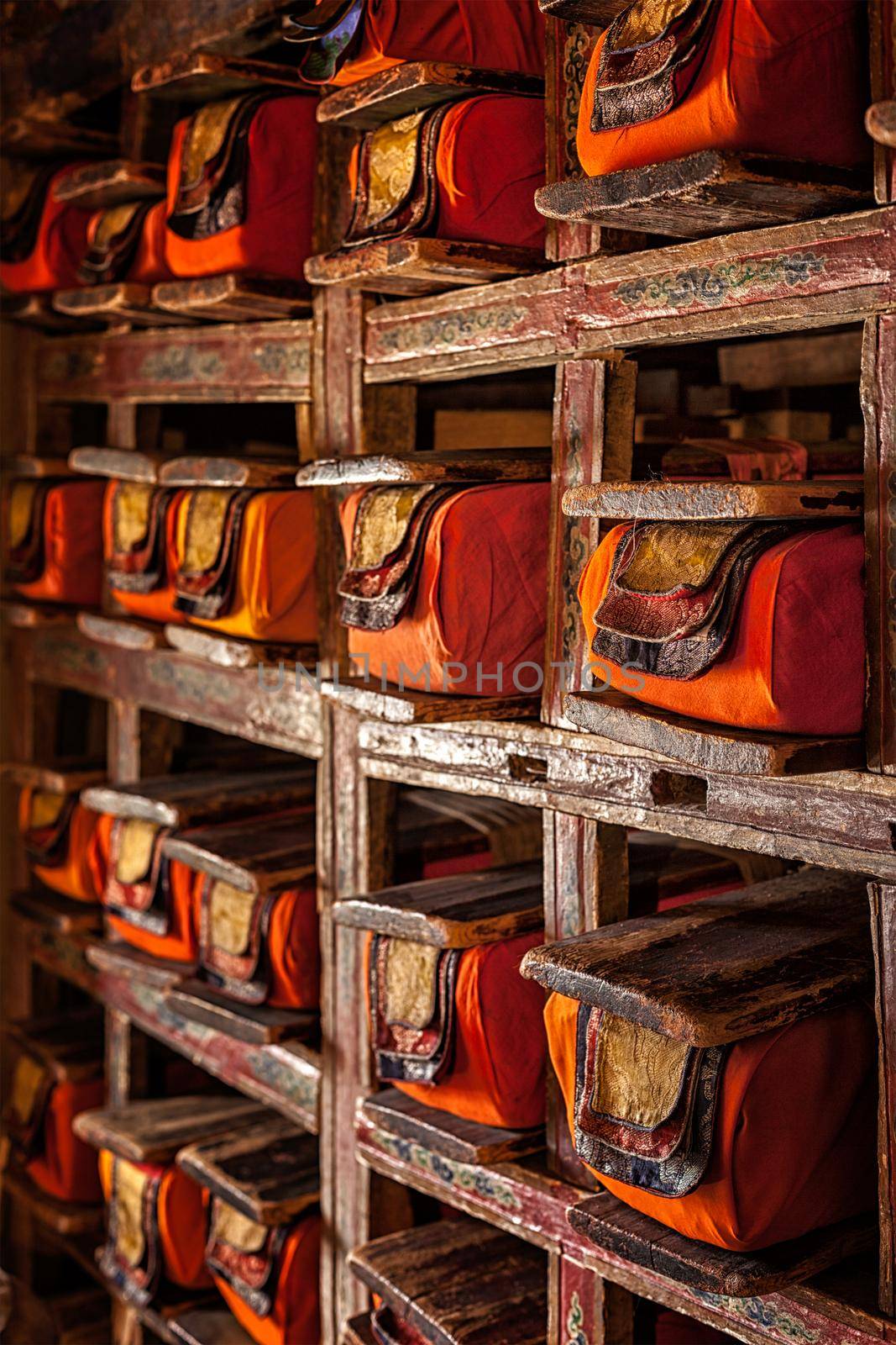 Folios of old manuscripts in library of Thiksey Gompa (Tibetan Buddhist Monastery). Ladakh, India