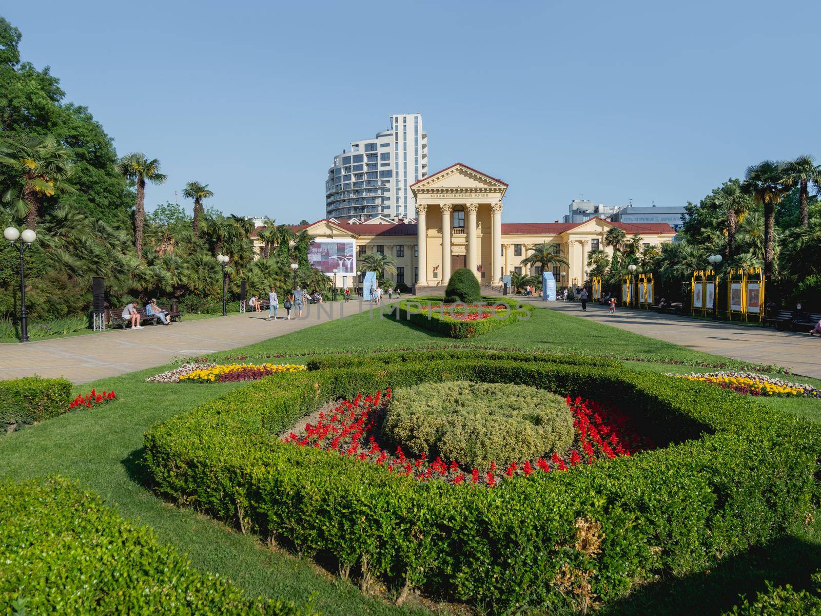 SOCHI, RUSSIA - May 27, 2021. Well keeped flower beds and lawns in front of Sochi Art Museum of Dmitry Zhilinsky. Landscaping on town square.