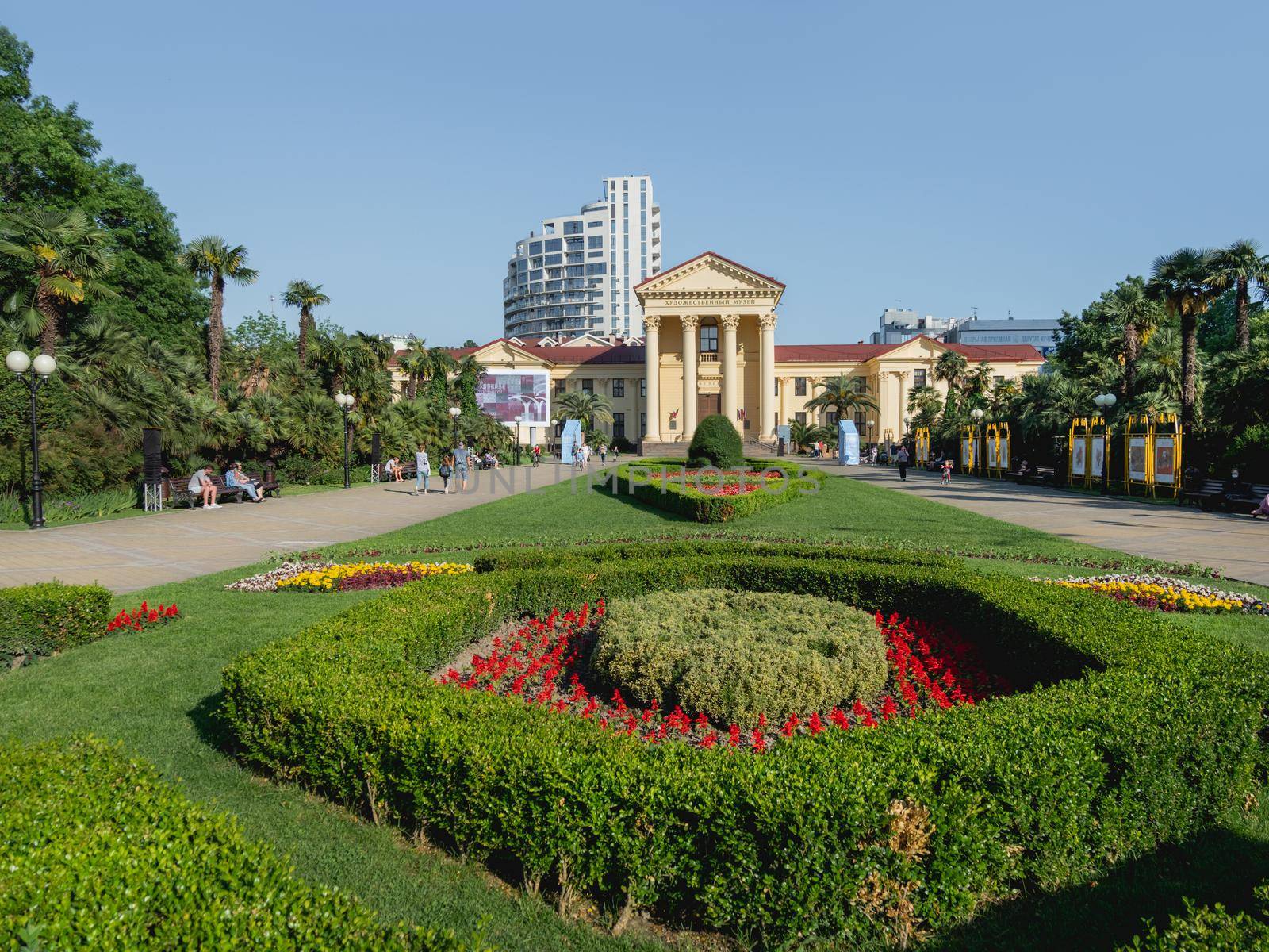 SOCHI, RUSSIA - May 27, 2021. Well keeped flower beds and lawns in front of Sochi Art Museum of Dmitry Zhilinsky. Landscaping on town square. by aksenovko