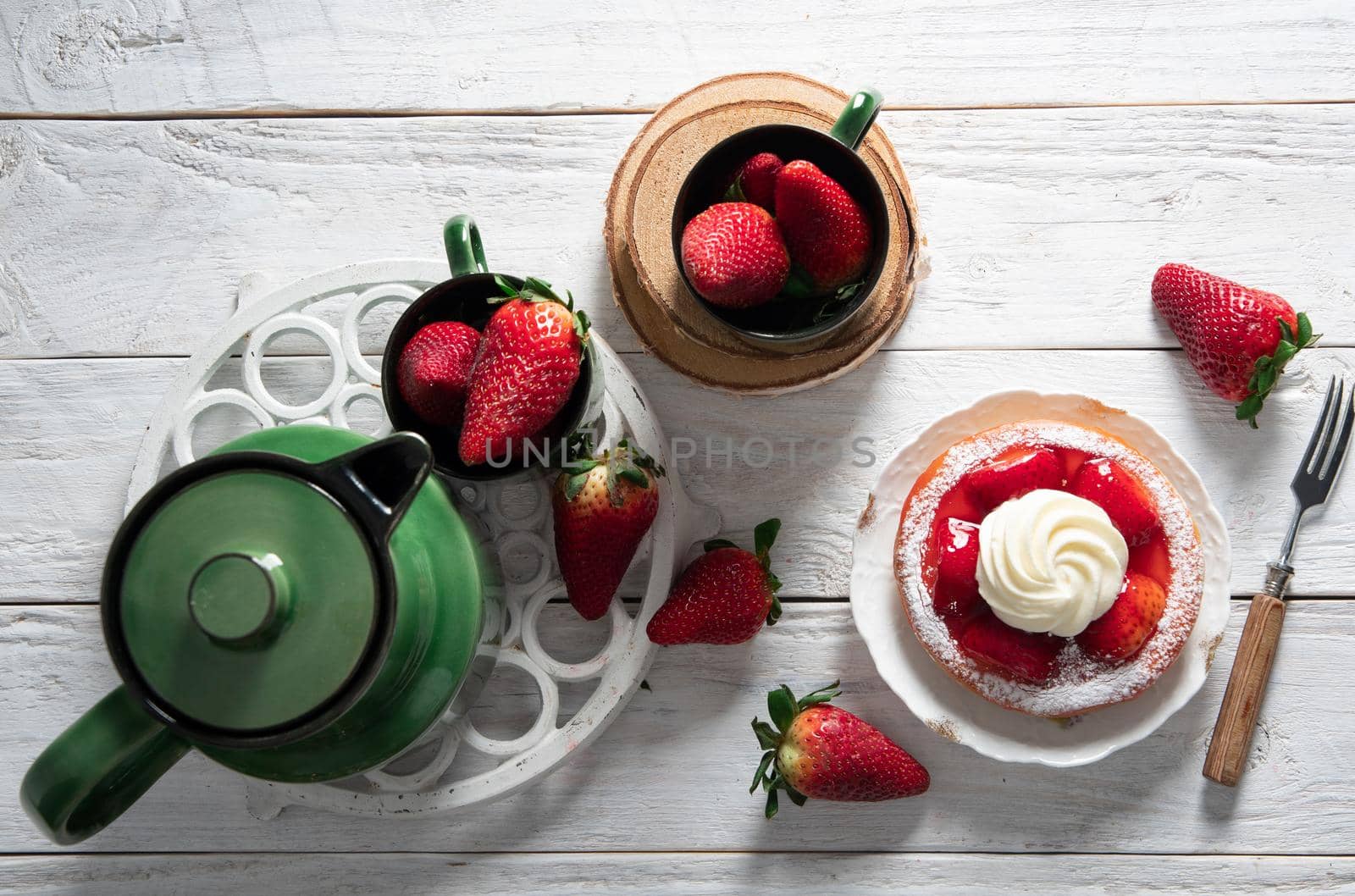 Fruit still life with strawberries and green tea set, strawberry cake with cream by KaterinaDalemans