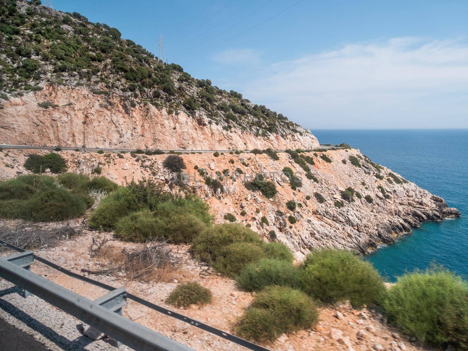 Mountain serpentine road along Mediterranean sea. Demre Finike Yolu road . Turkey.