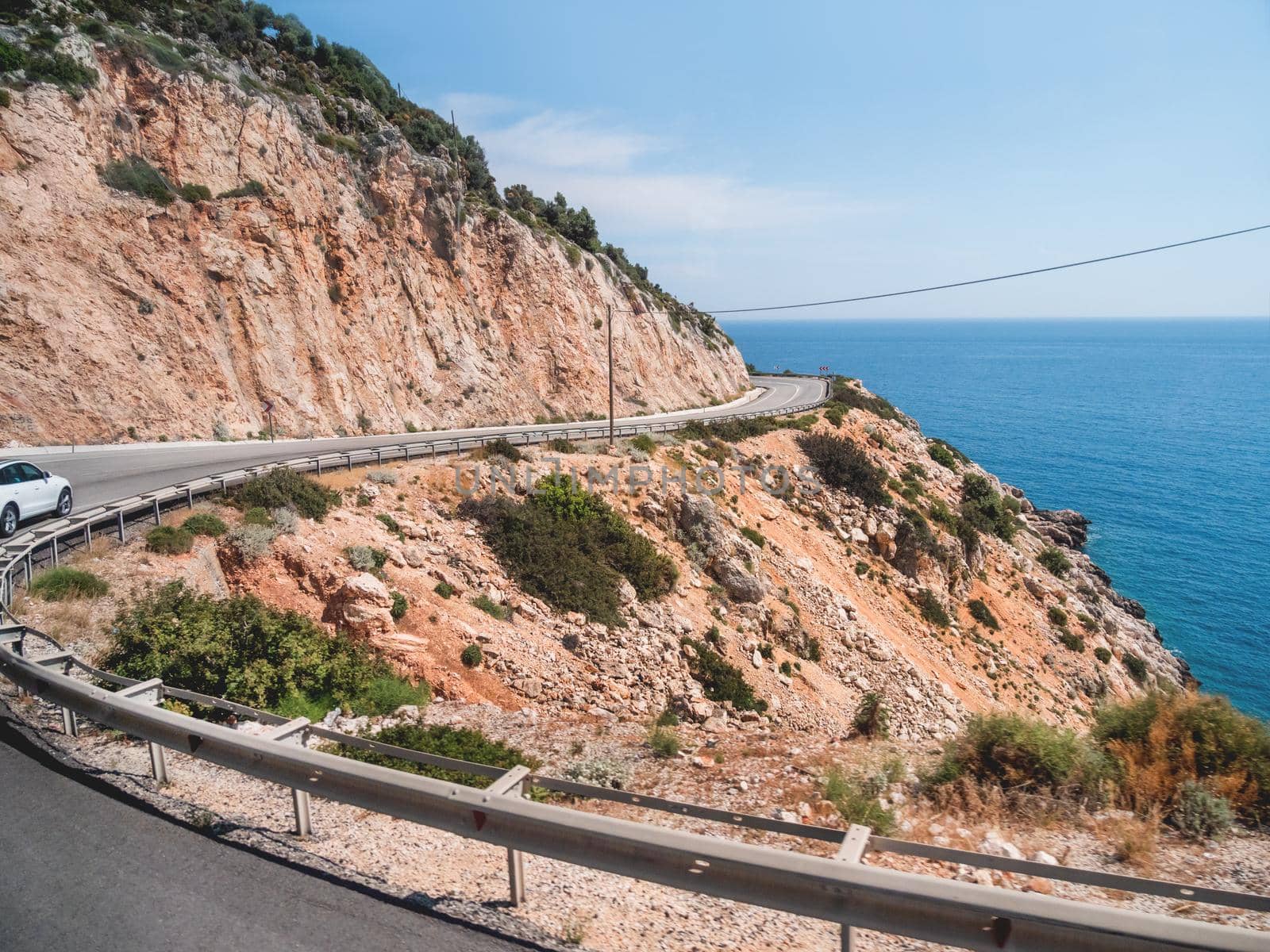 Mountain serpentine road along Mediterranean sea. Demre Finike Yolu road . Turkey.