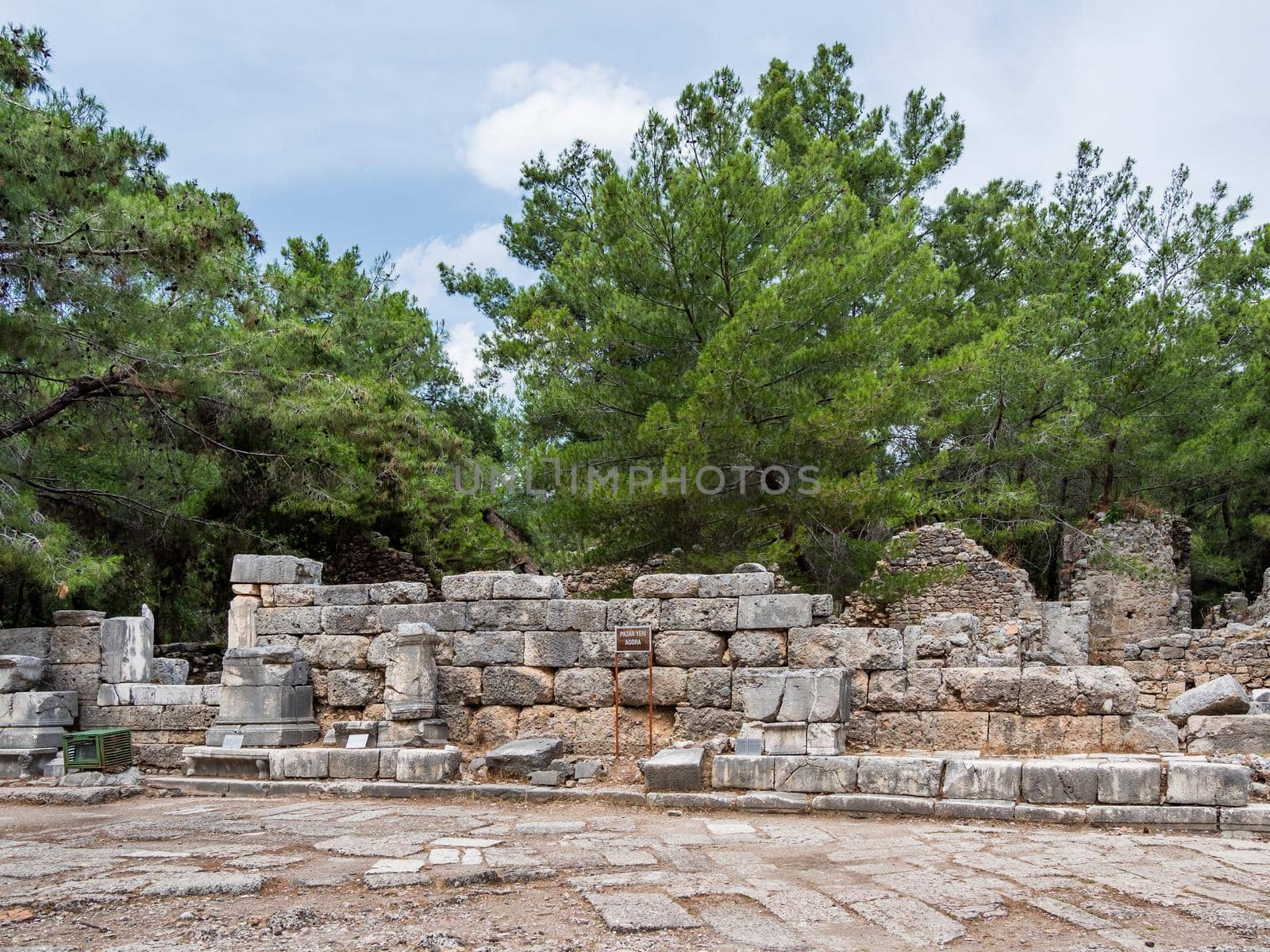 Agora, ruined market square in ancient Phaselis city. Famous architectural landmark in Turkey. by aksenovko