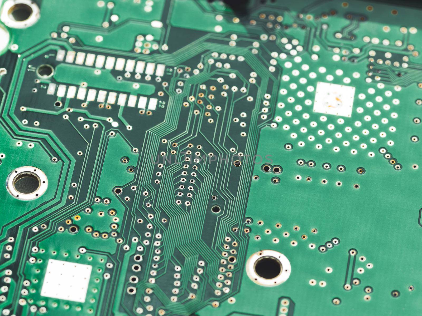Macro photo of hard disk controller board. IT detail in computer. Technical background.