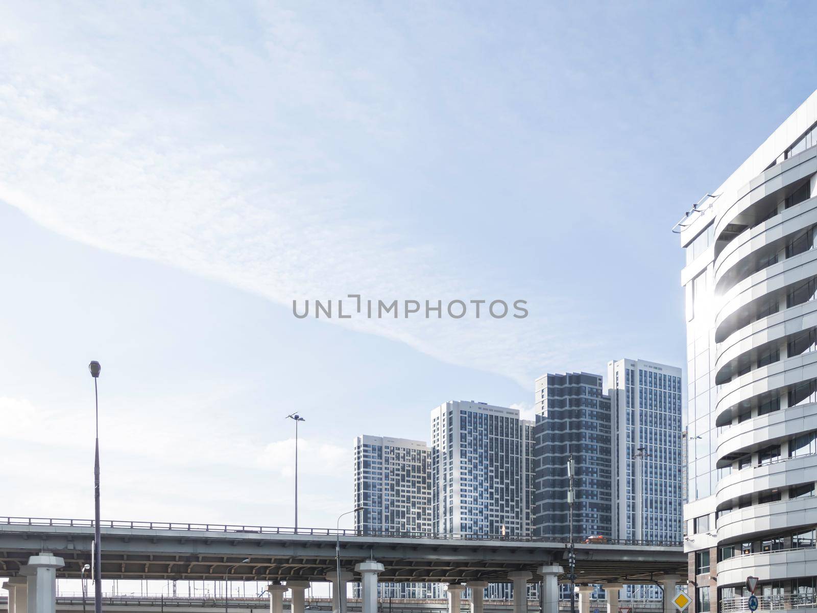 New residential district of Moscow. Modern architecture of apartment buildings. Horizontal banner with clear blue sky. Russia.