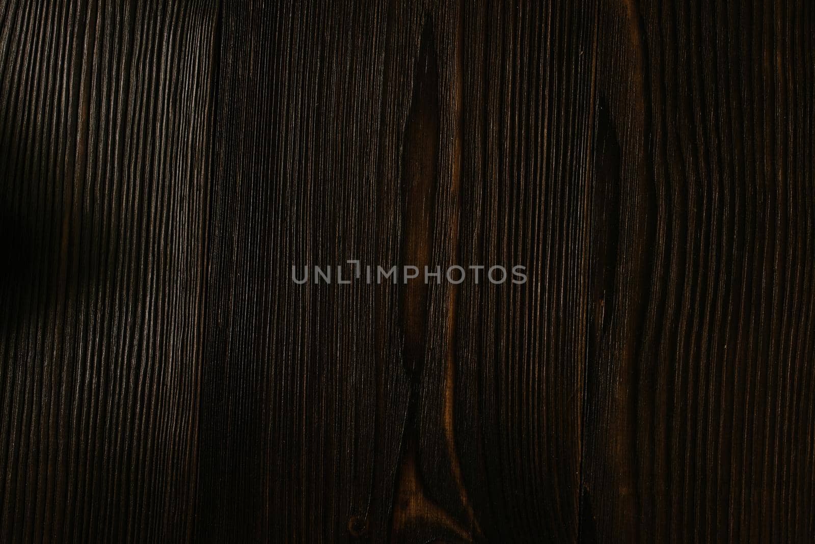 Dark wood texture background. painted Wide board. view from above