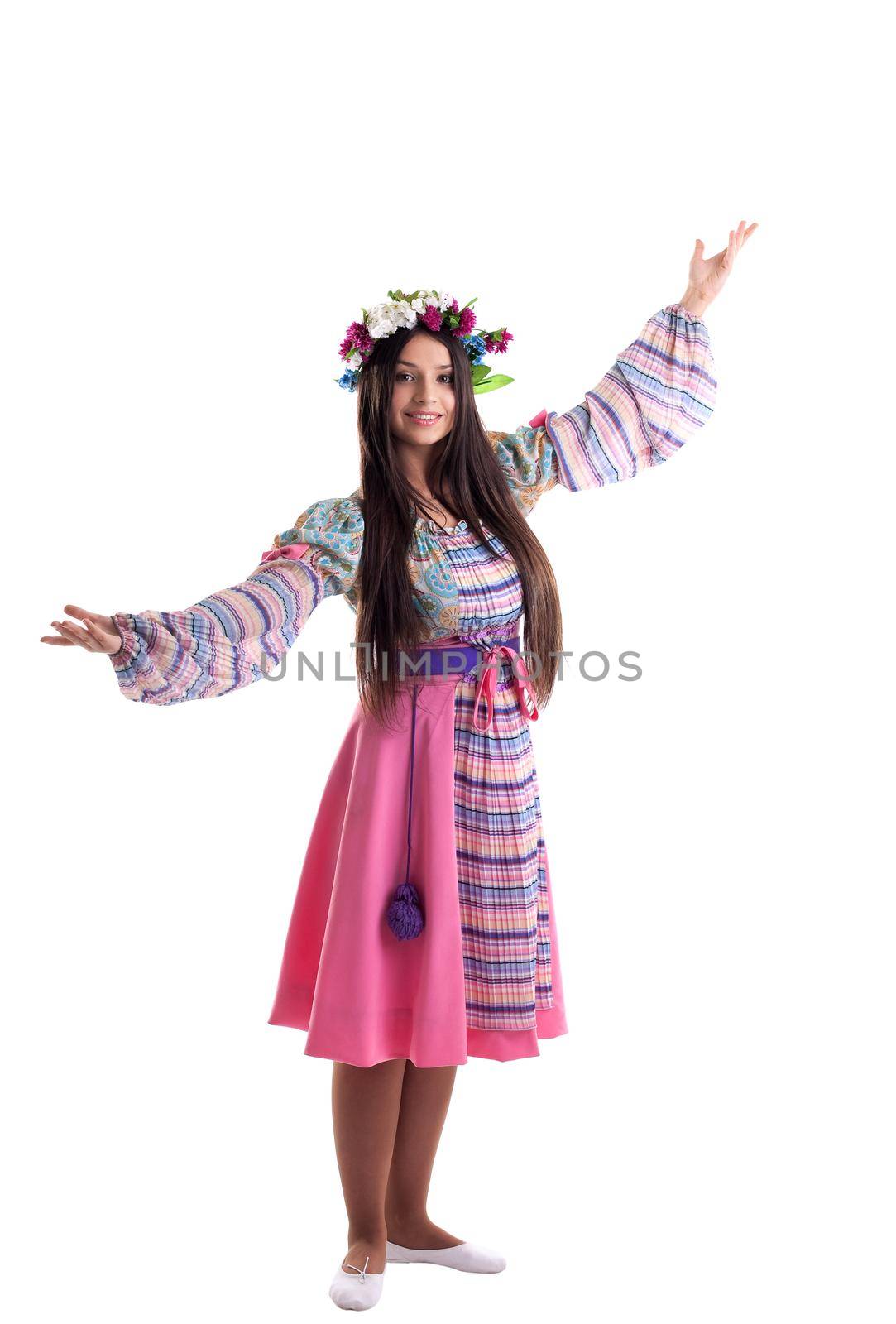 Beauty young girl with garland in traditional russian costume