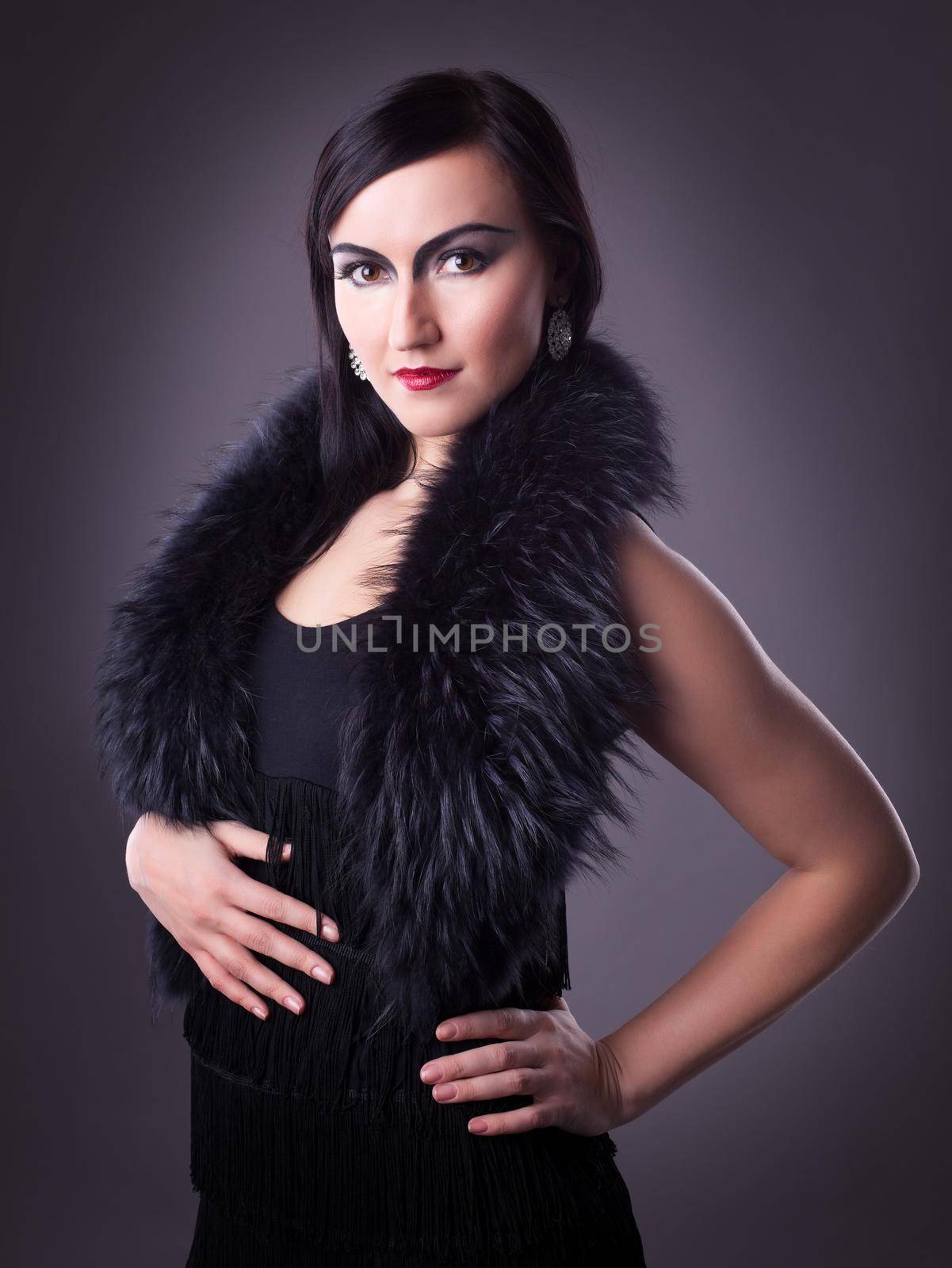 young woman in fur boa portrait - retro style make-up