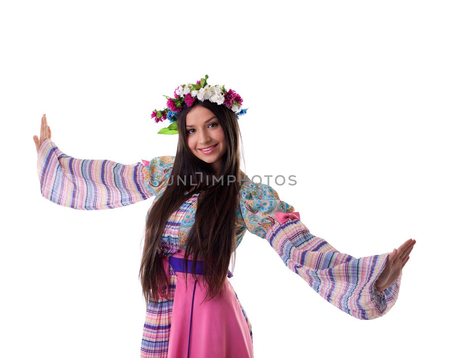 Beauty young girl with garland in traditional russian costume