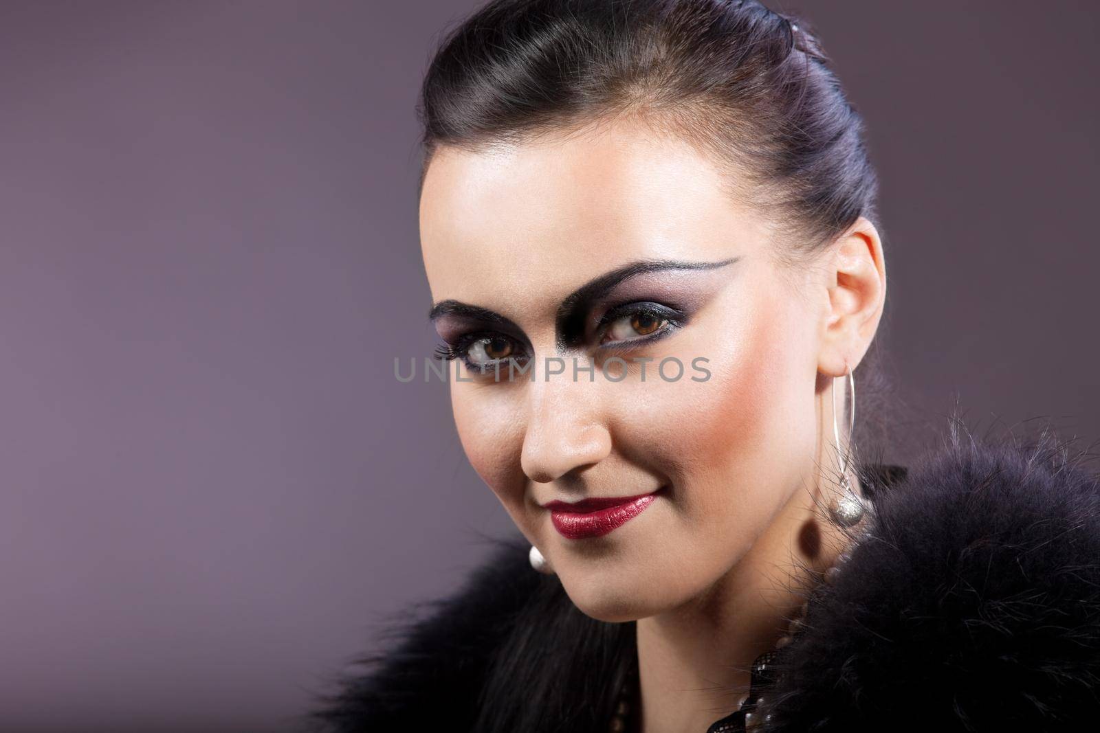 Young woman portrait in retro style make-up