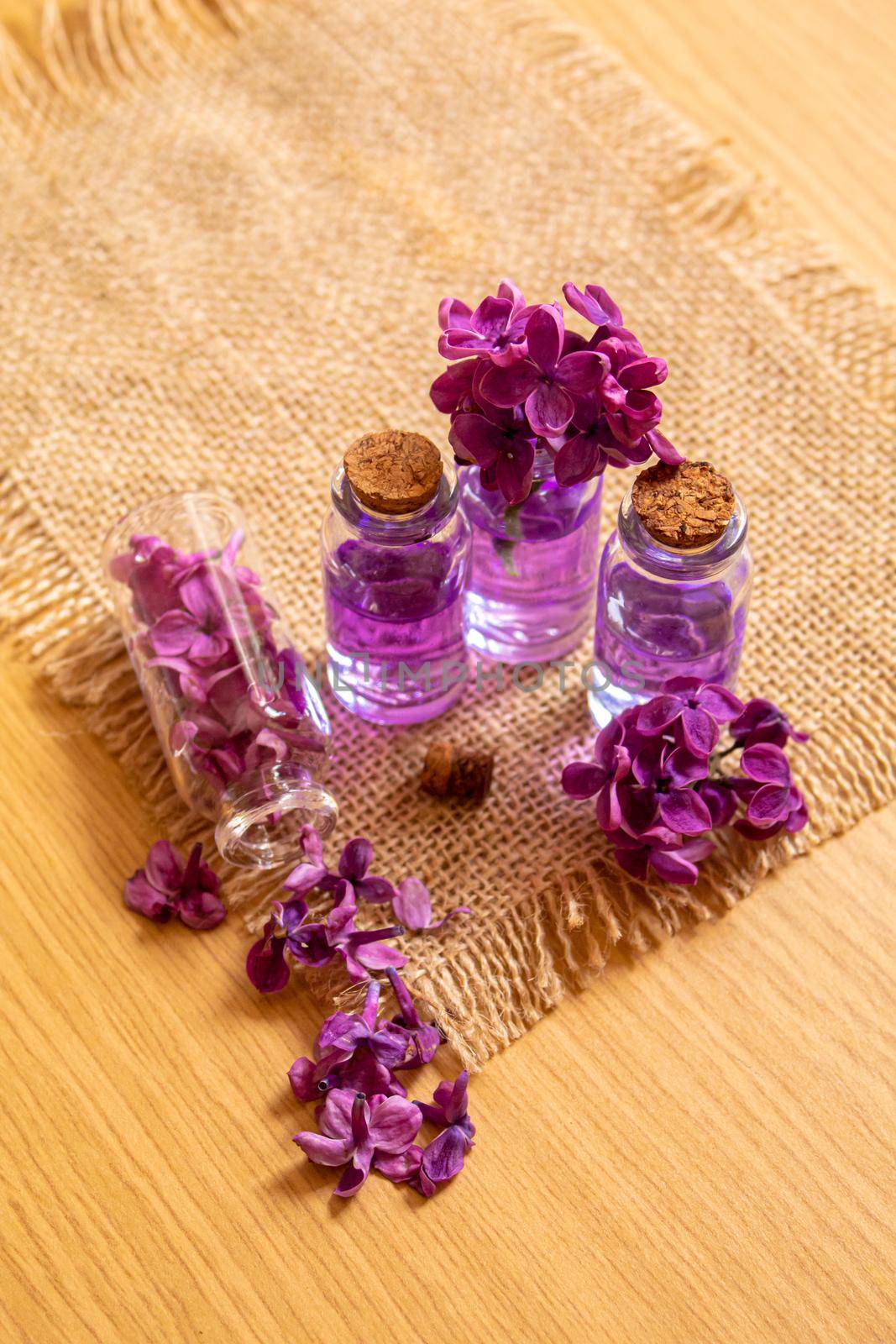 lilac oil in small bottles. selective focus.nat