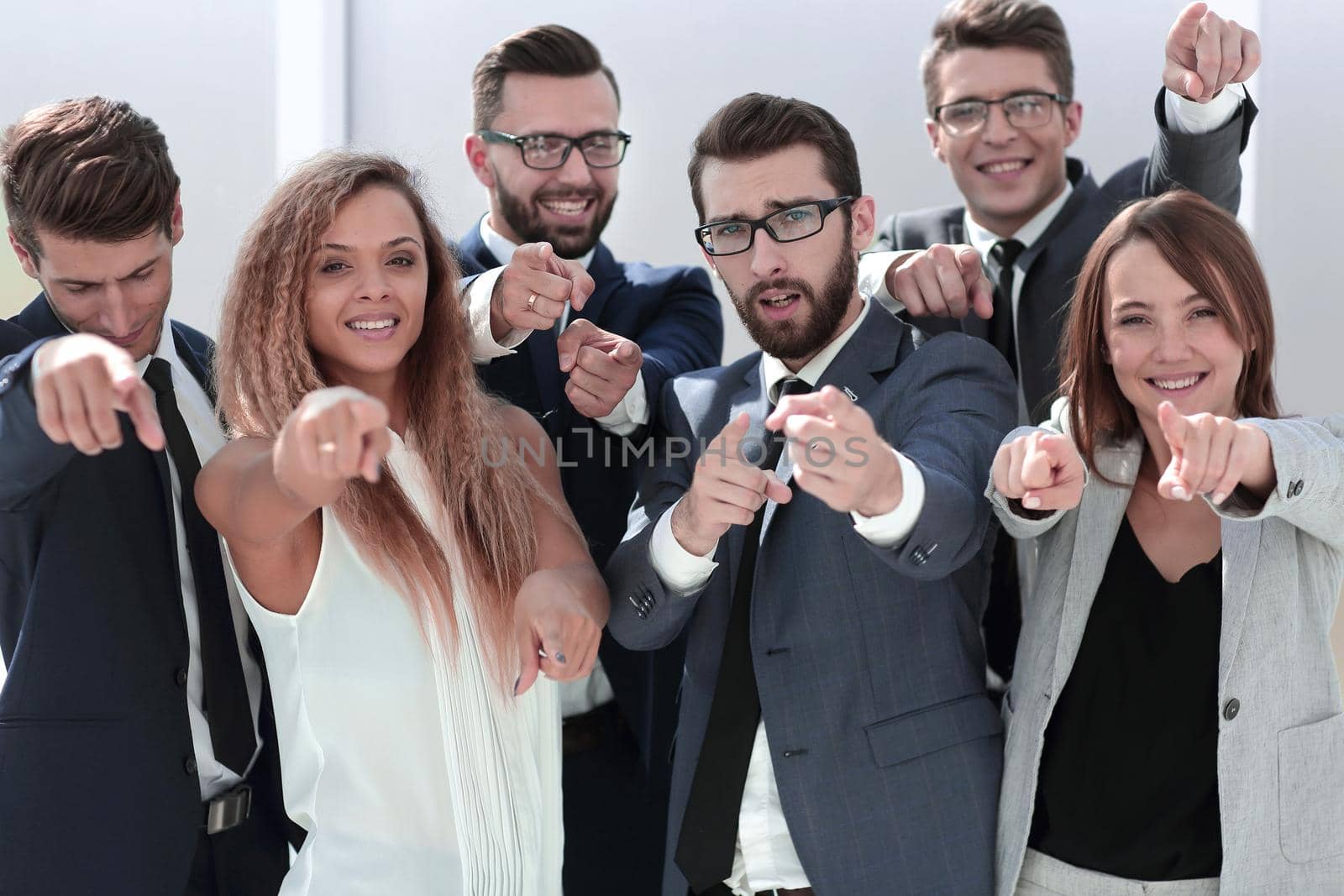 close up. successful business team pointing at you.business concept
