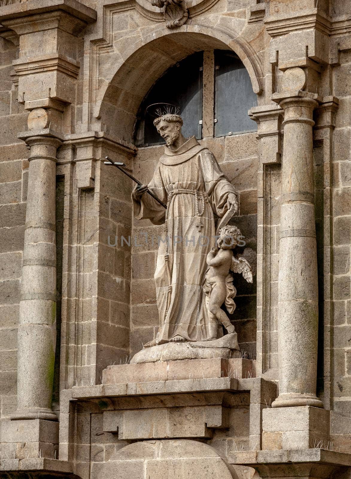 Religious statue on a house in Santiago de Compostela, Spain