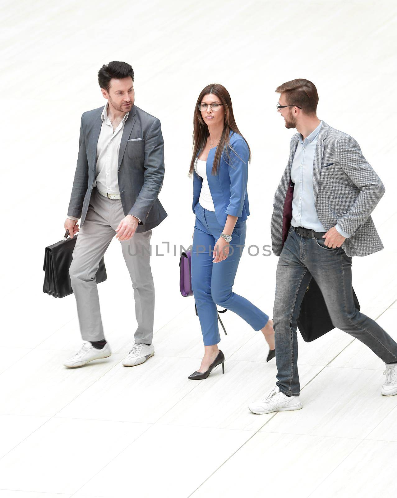 business people walking together by asdf