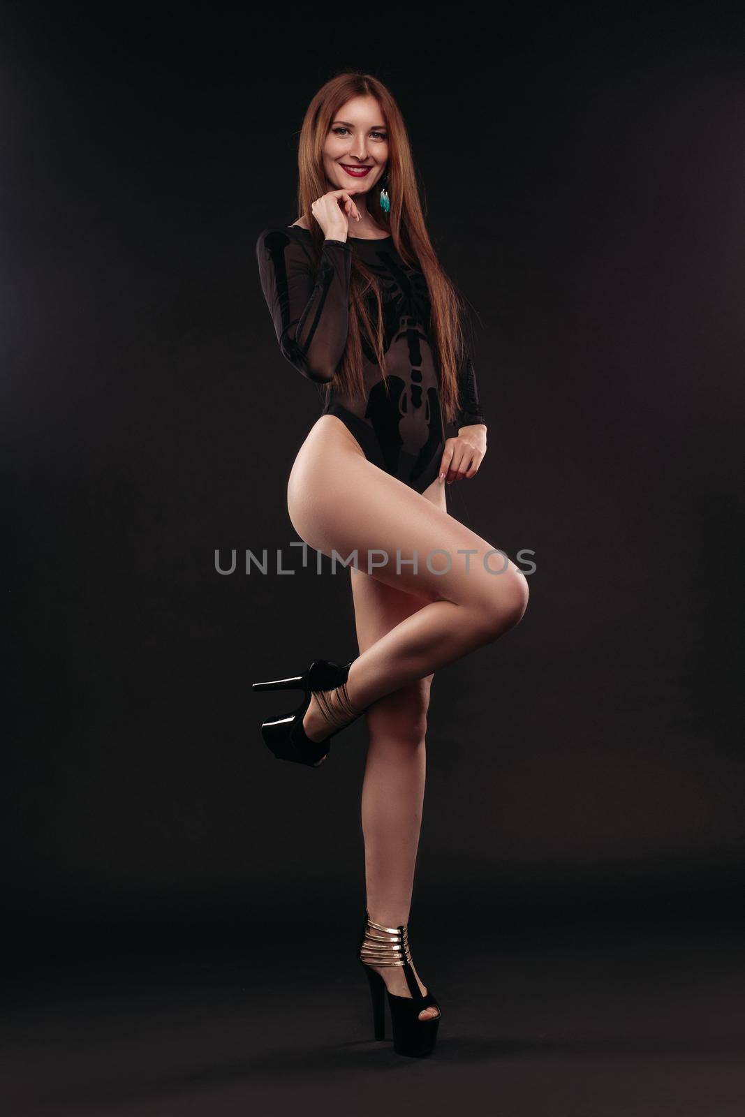 Sexy dancer in black meshy bodies and high heels. by StudioLucky