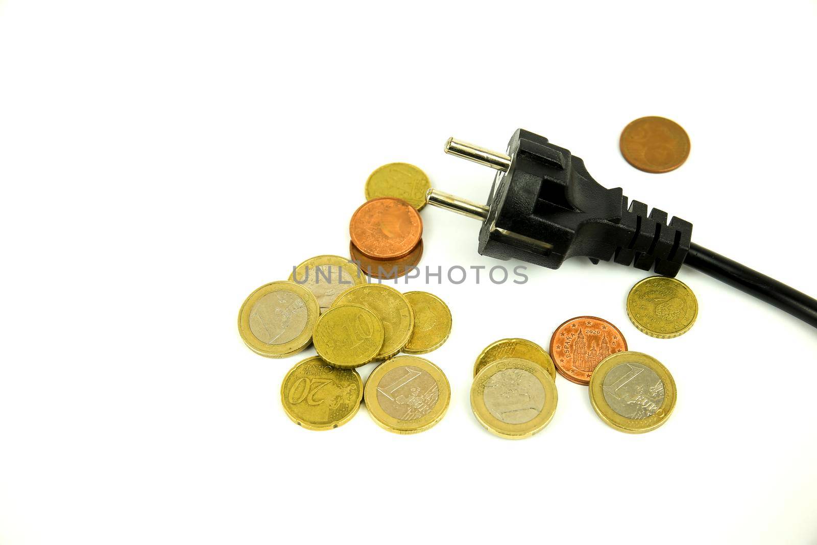 Pin power plug and coins on white background by soniabonet