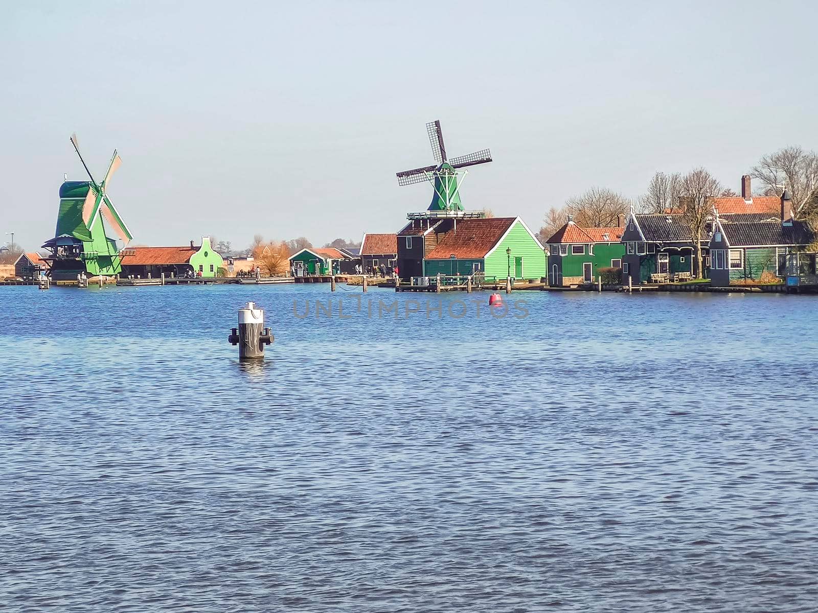 ancient Dutch windmills by Zaanse Schans, travel reportage