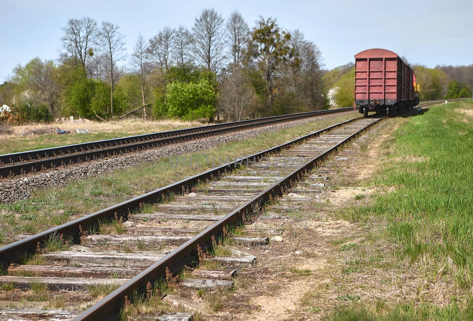Industrial railway train wheel technology close up perspective concept background. Old railroad.
