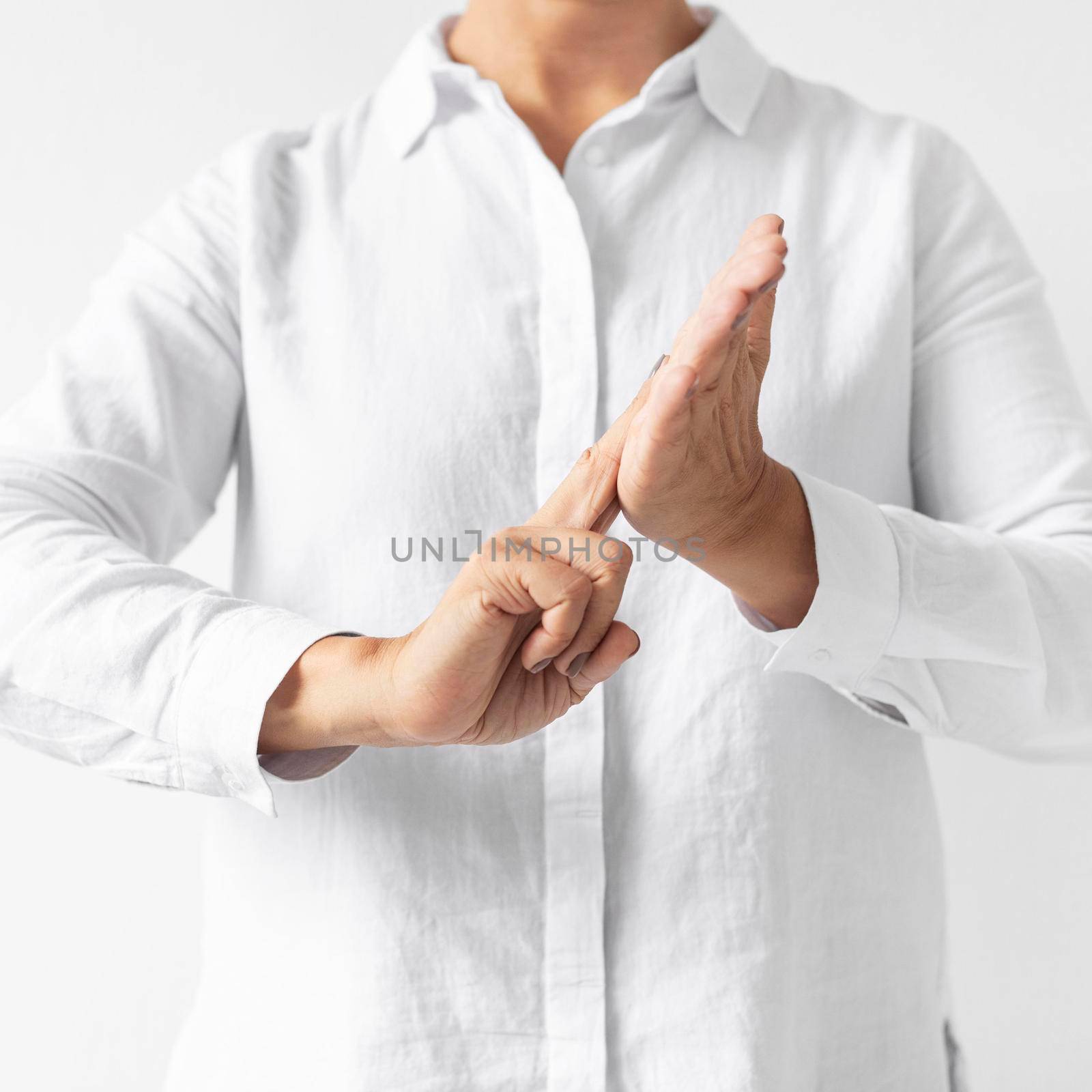 portrait woman teaching sign language