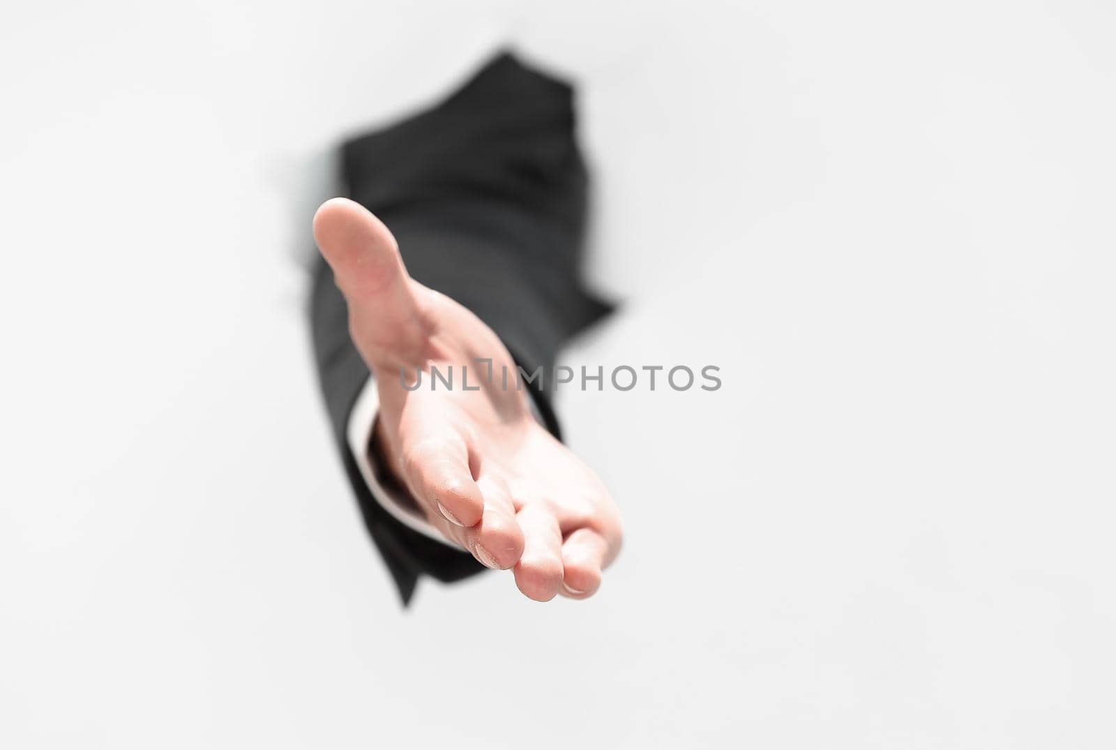 men holding out his hand for a handshake . photo with copy space