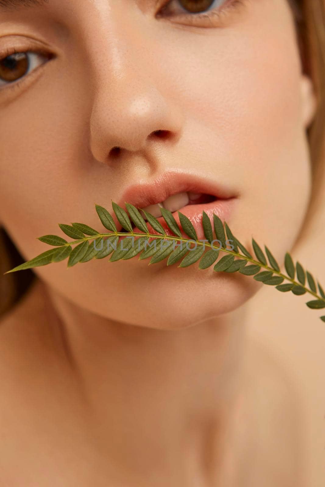 close up woman posing with plant