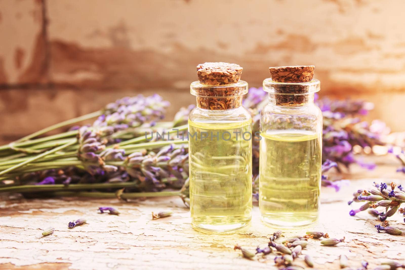 Lavender essential oil in a small bottle. Selective focus. nature.