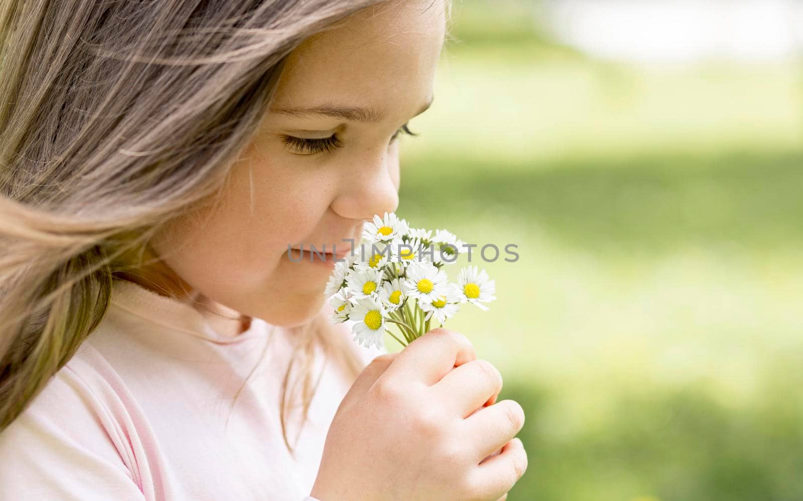 close up girl smelling bouquet field flowers by Zahard