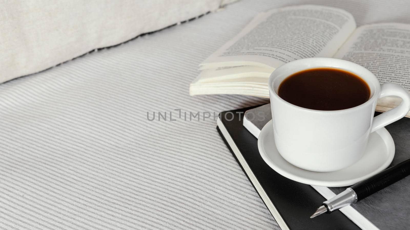 high angle coffee cup book