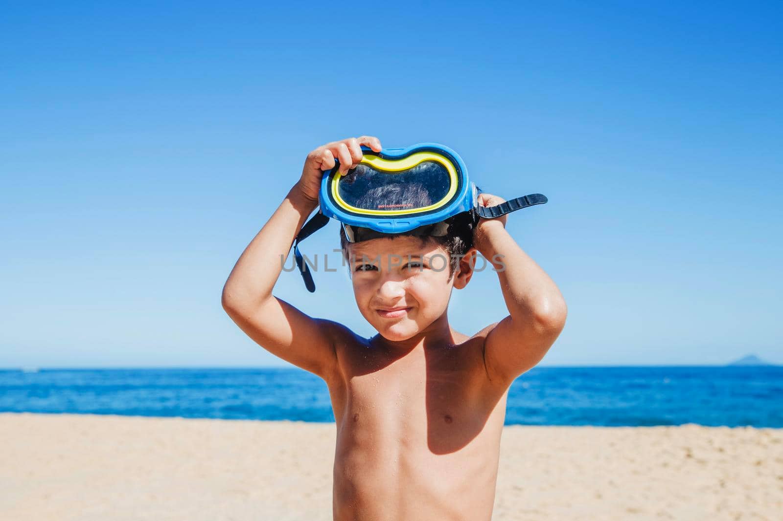 little boy with goggles