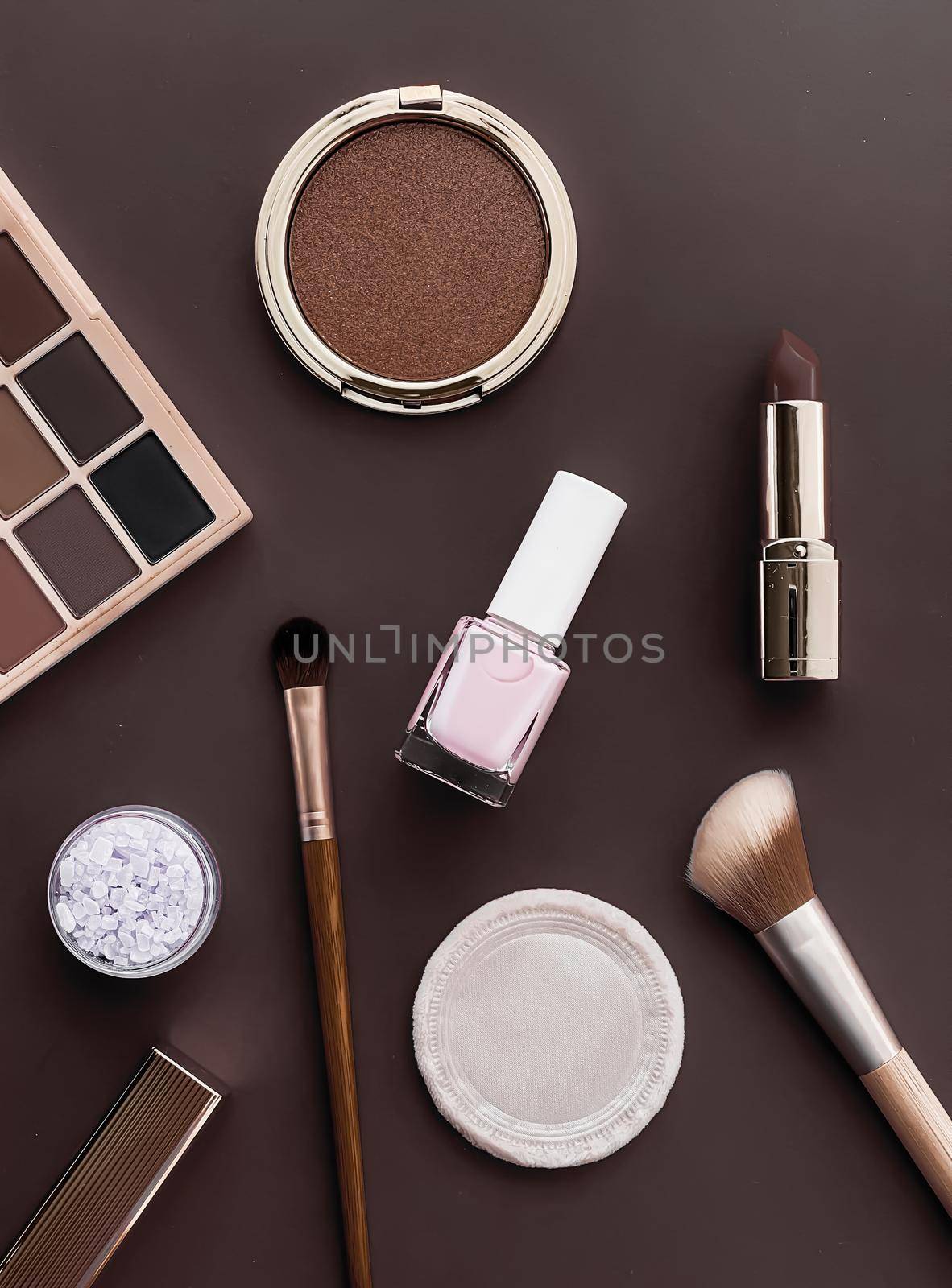 Beauty, make-up and cosmetics flatlay design with copyspace, cosmetic products and makeup tools on brown background, girly and feminine style by Anneleven