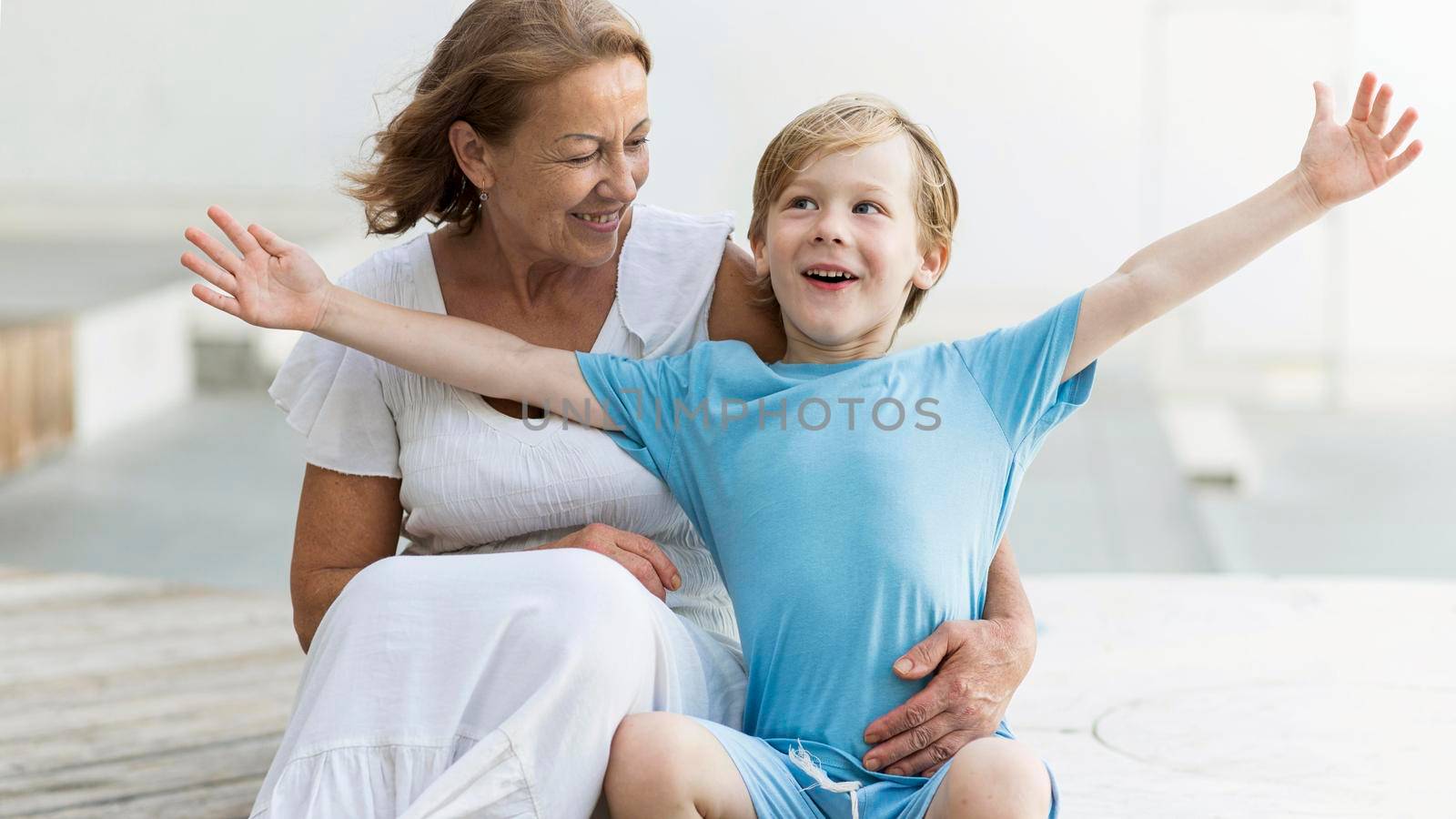 smiley woman holding grandson by Zahard