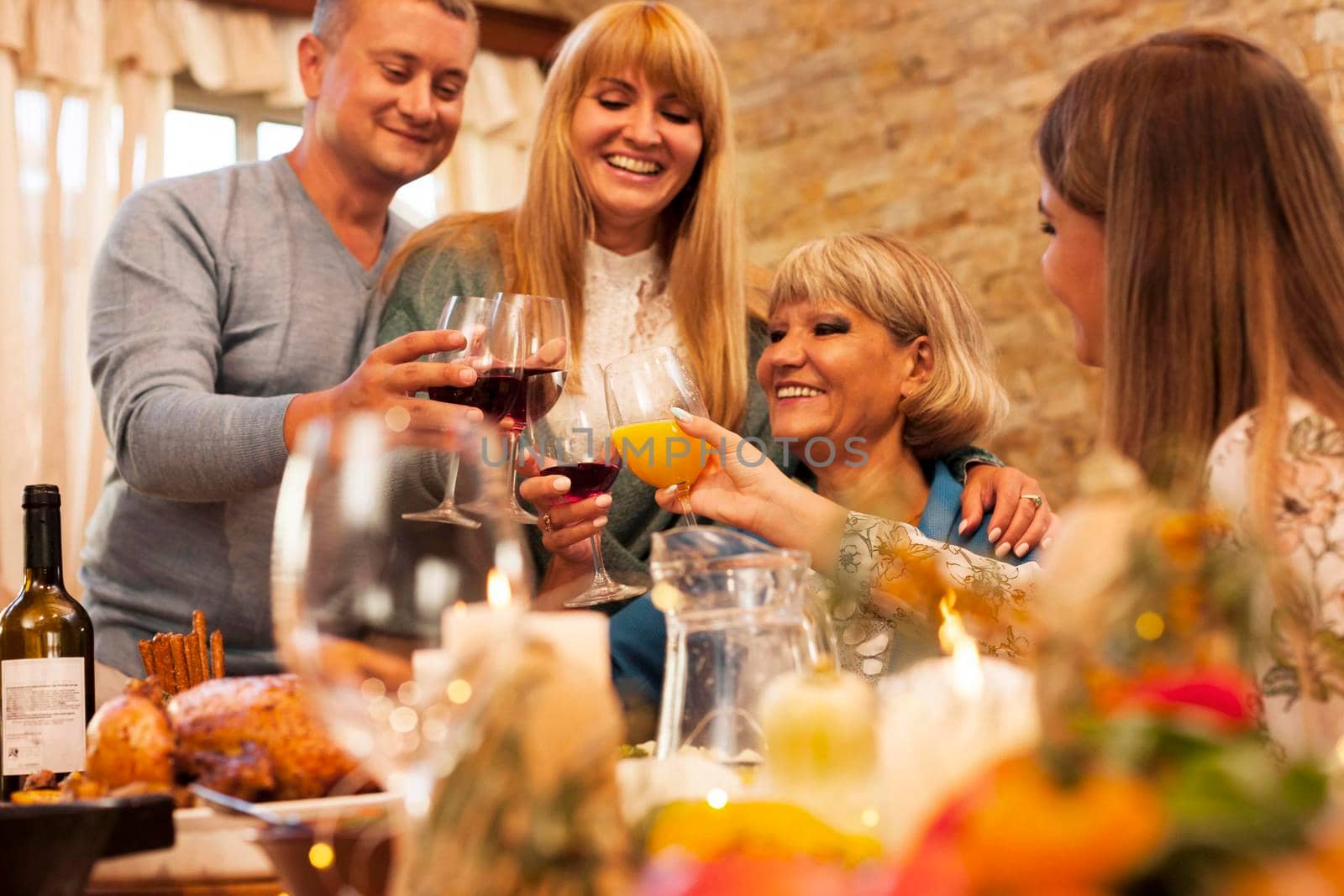 medium shot happy family toasting