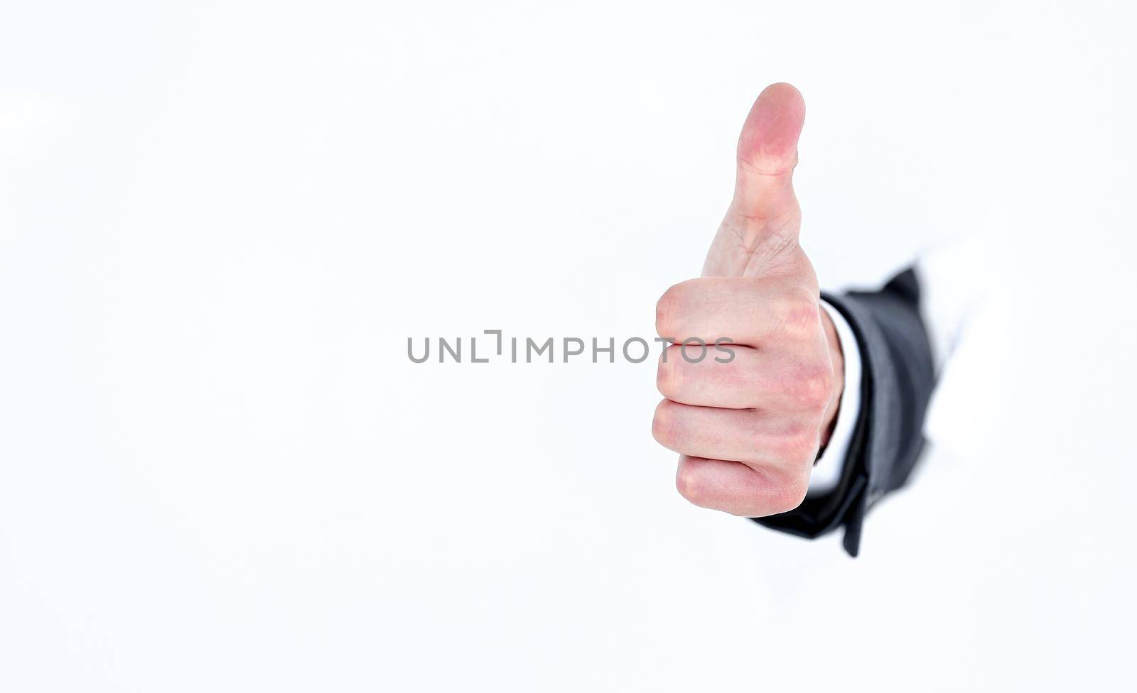 businessman's hand with a thumb gesture up by asdf