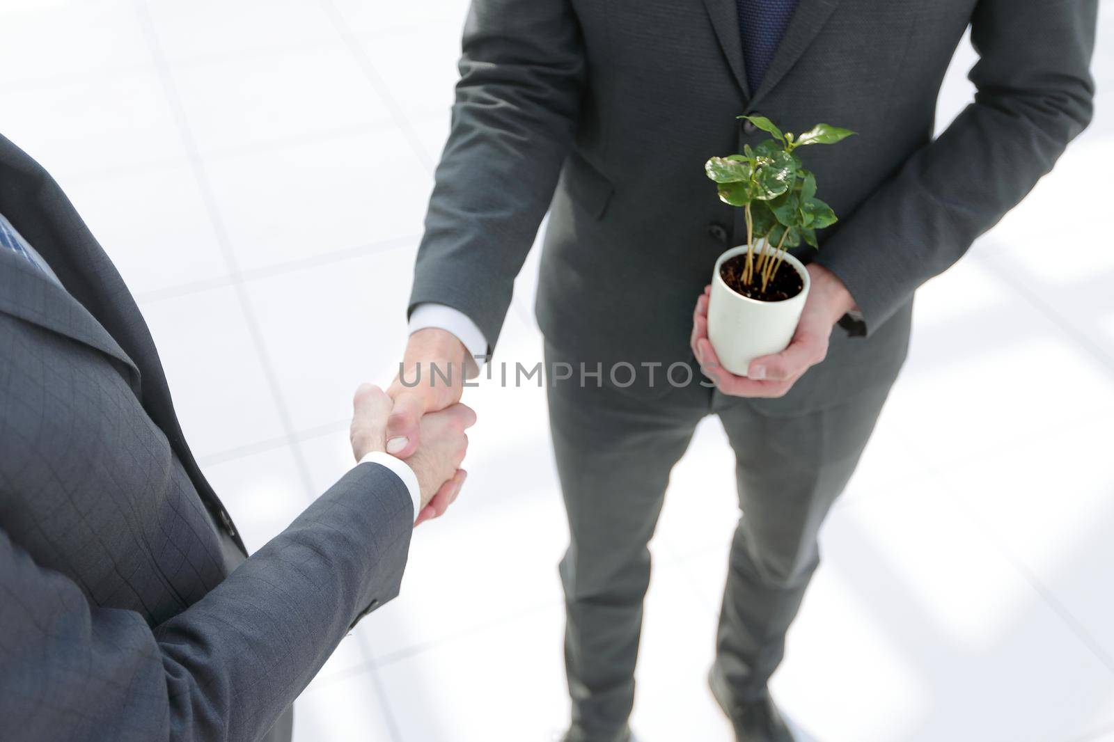 close up.handshake business people by asdf