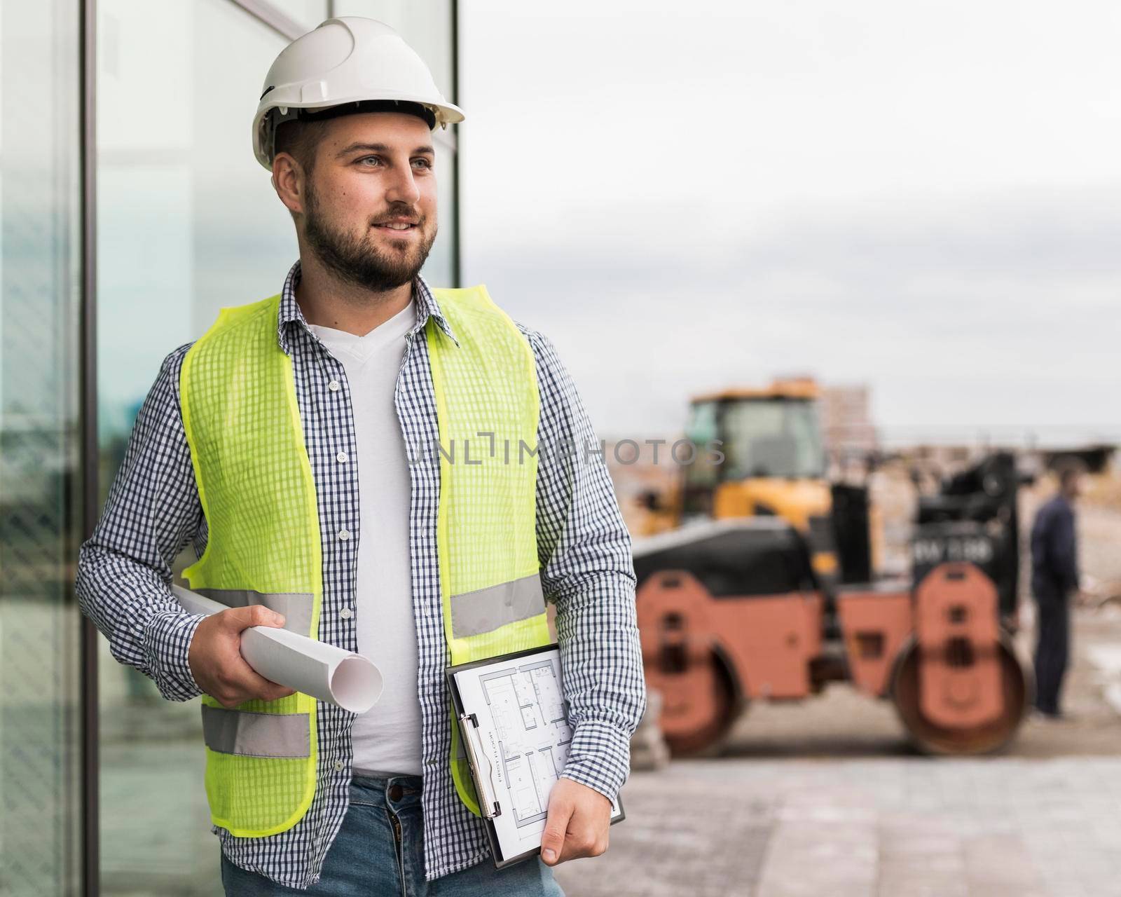 medium shot smiley man holding project