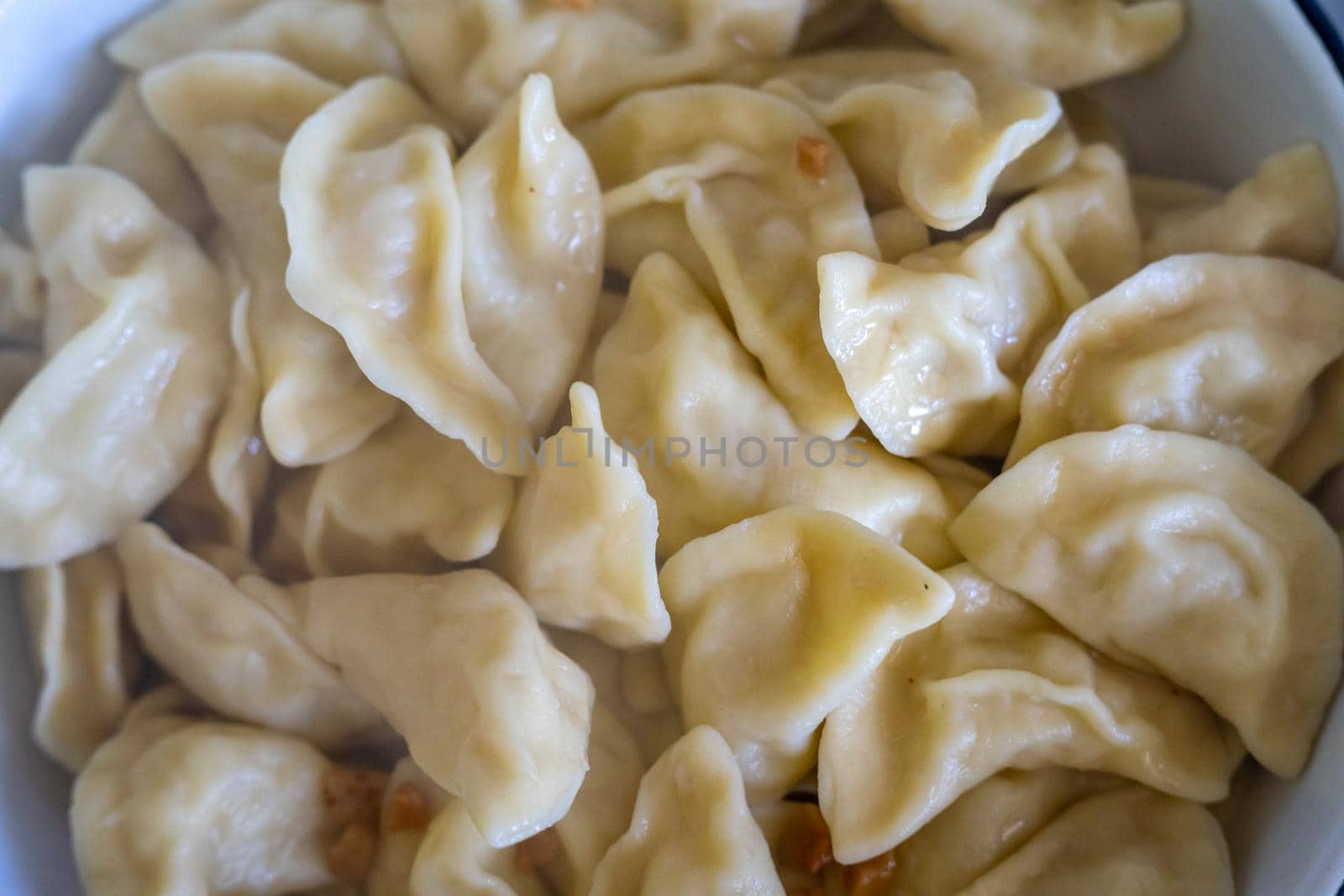 Ukrainian dumplings with lard Ready to eat by Serhii_Voroshchuk