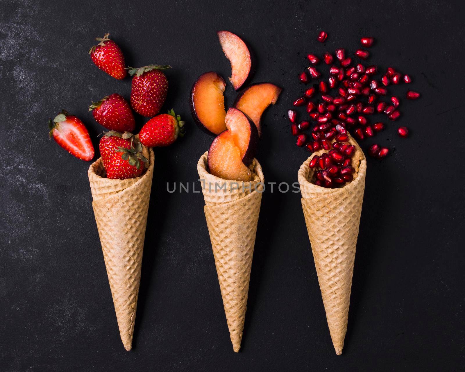 ice cream cones with fruits