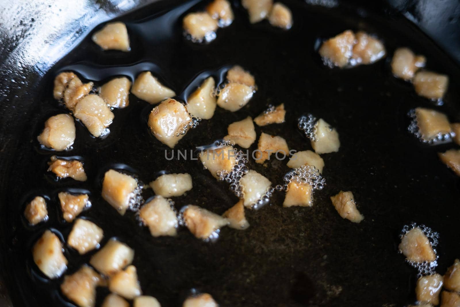 The greaves are fried in a pan. Traditional food of Ukrainians by Serhii_Voroshchuk