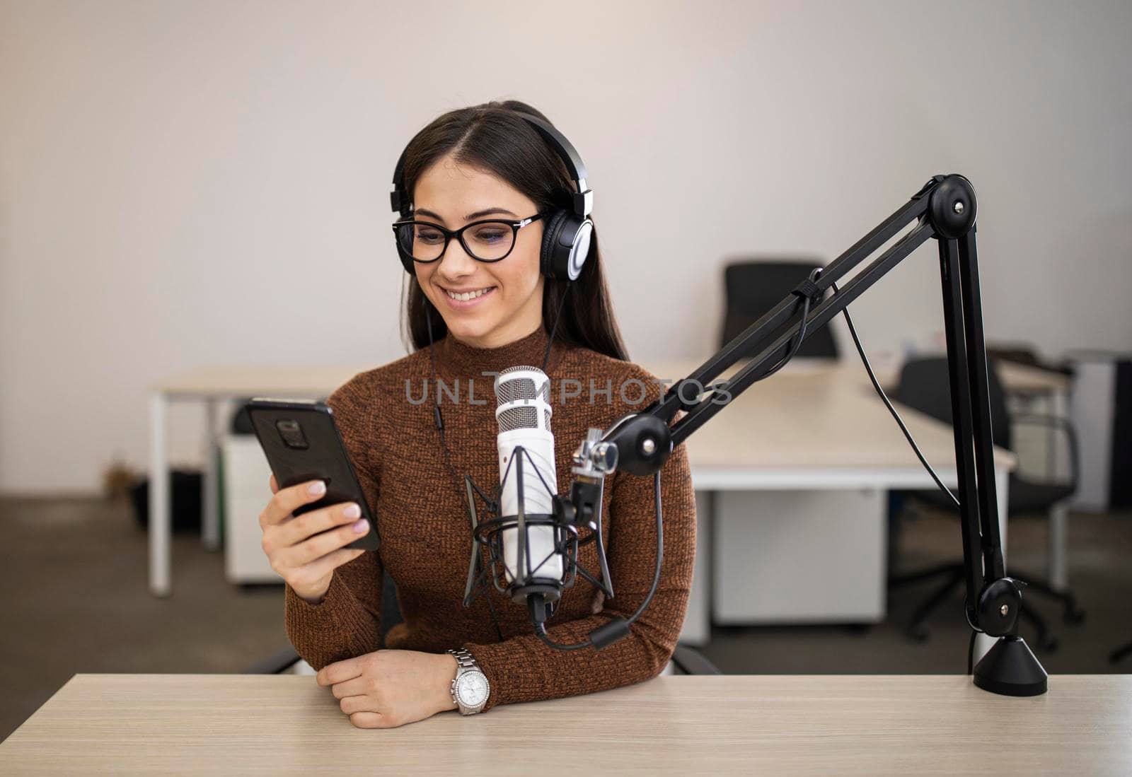 smiley woman doing radio show