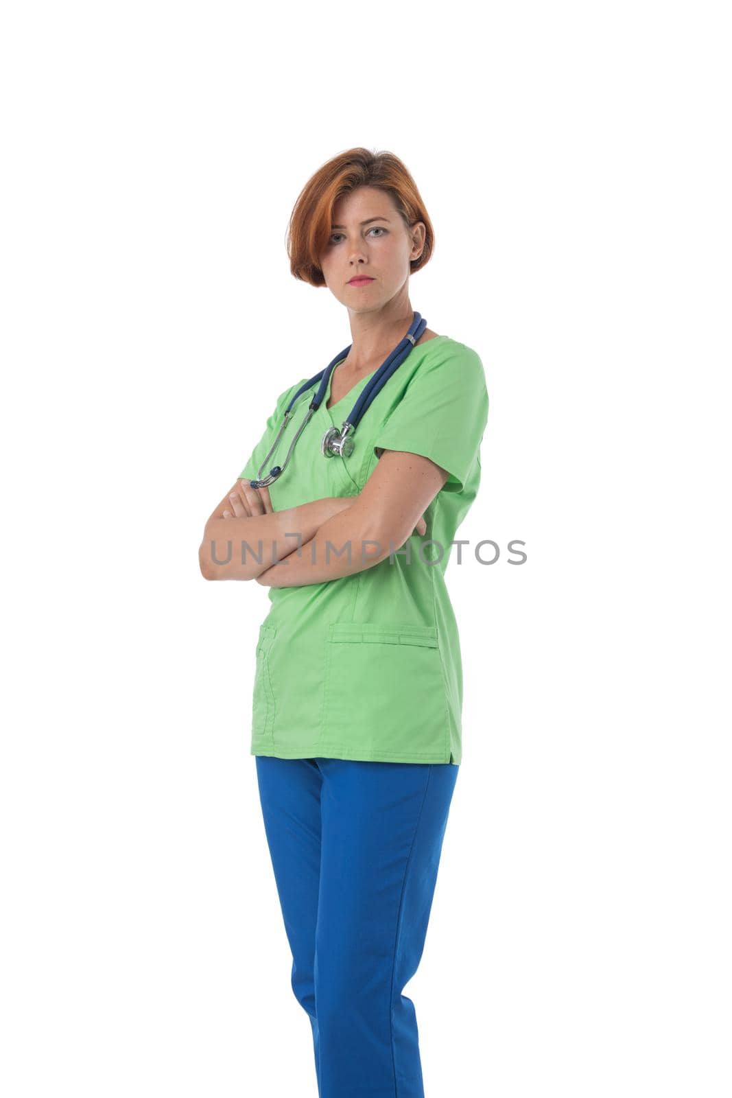 Medical nurse isolated on white background. Female medical professional doctor standing with arms folded