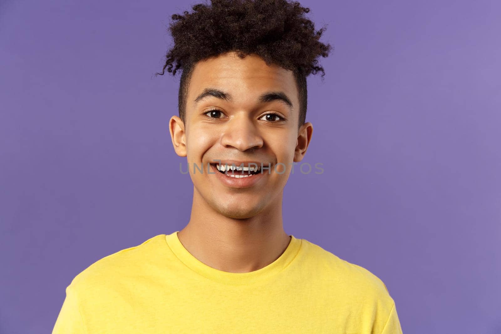 Close-up portrait of cheerful smiling man looking happy, express enthusiastic optimistic emotions, seeing something pleasant and interesting, standing purple background by Benzoix