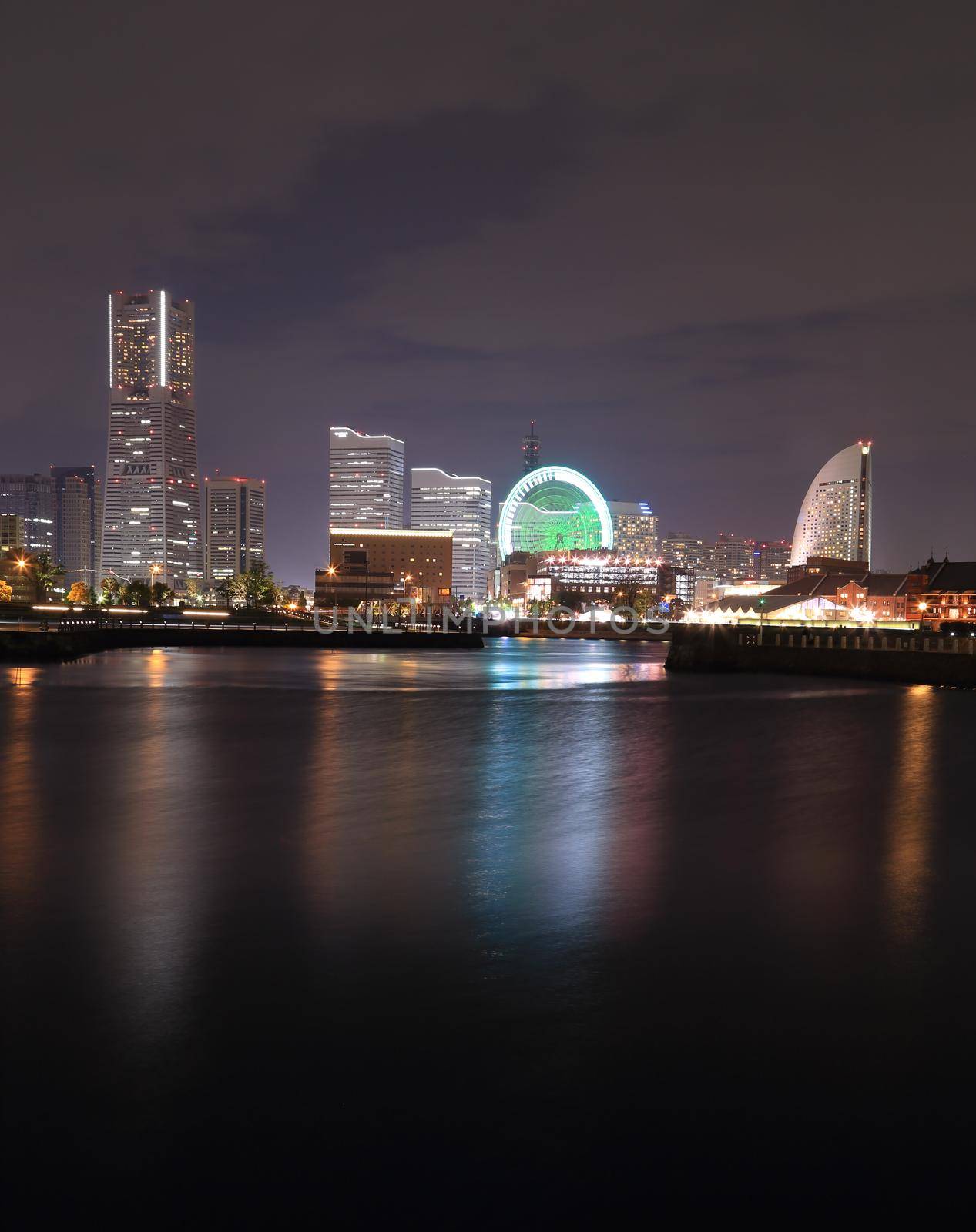 View of marina bay at night in Yokohama City by geargodz