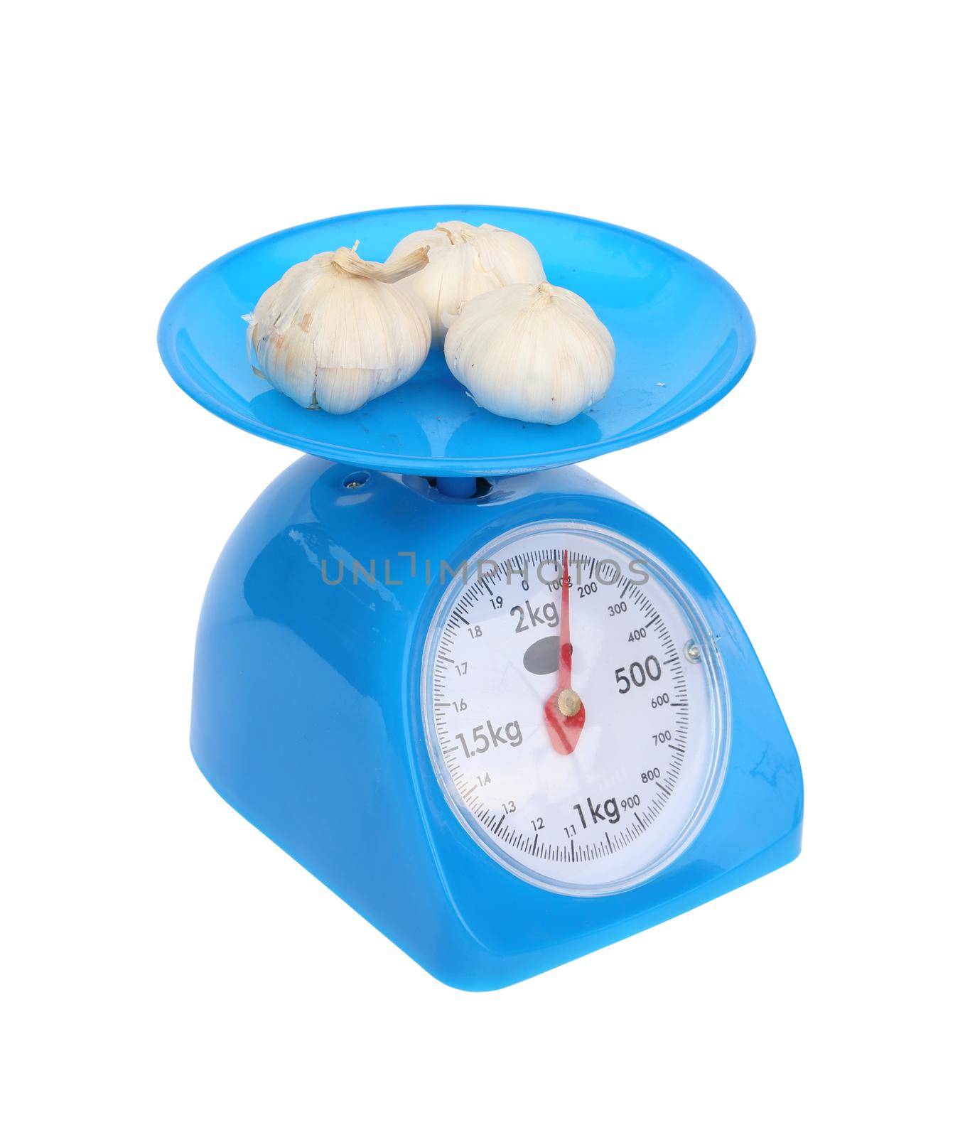 kitchen scales and garlic isolated on white background (with clipping path)