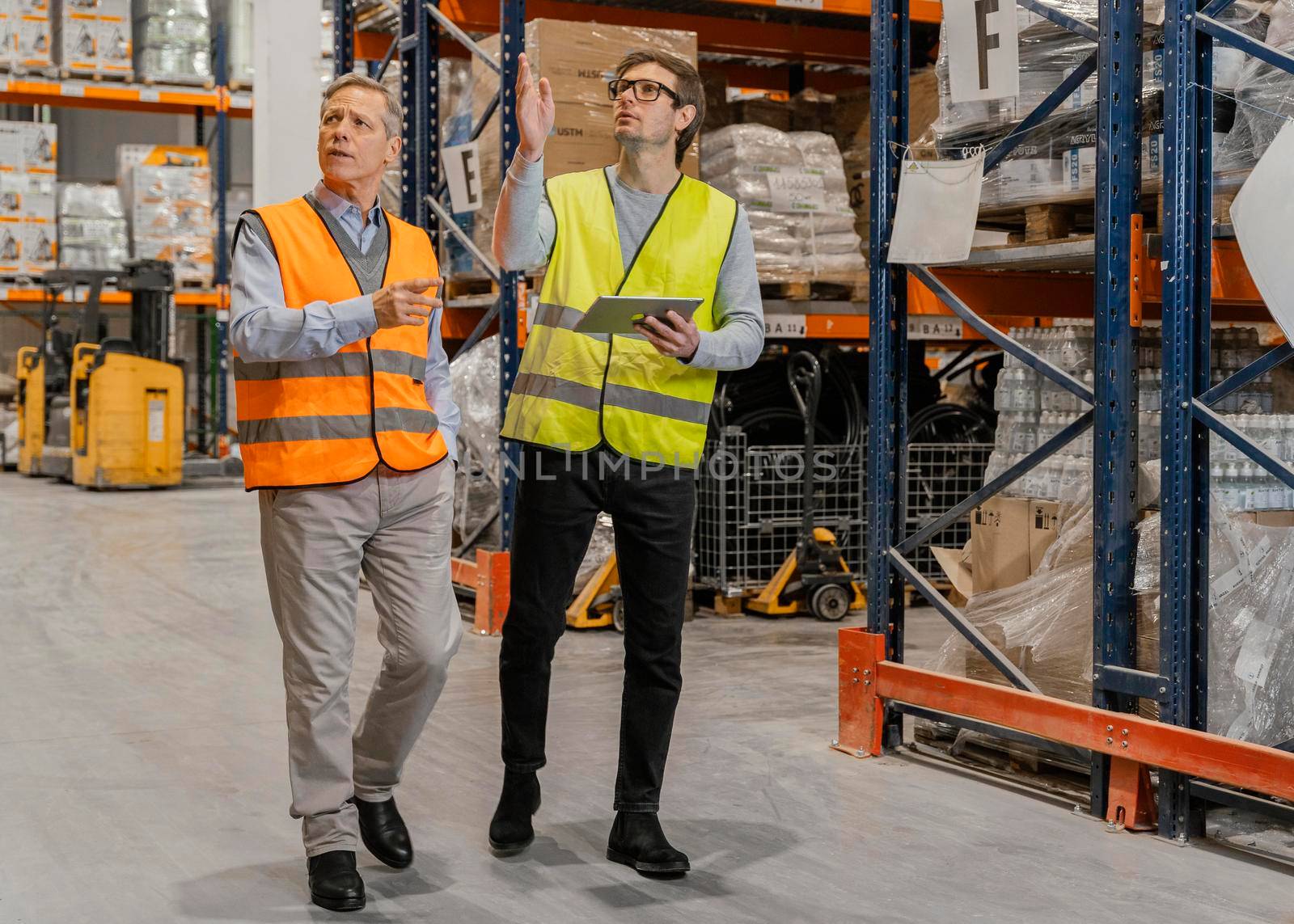 men with tablet working logistic