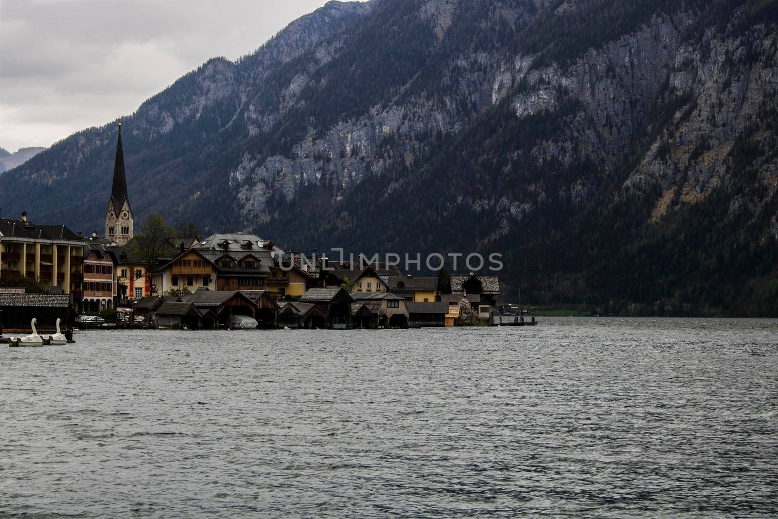 Hallstatt tourist town view from the lake in Austria