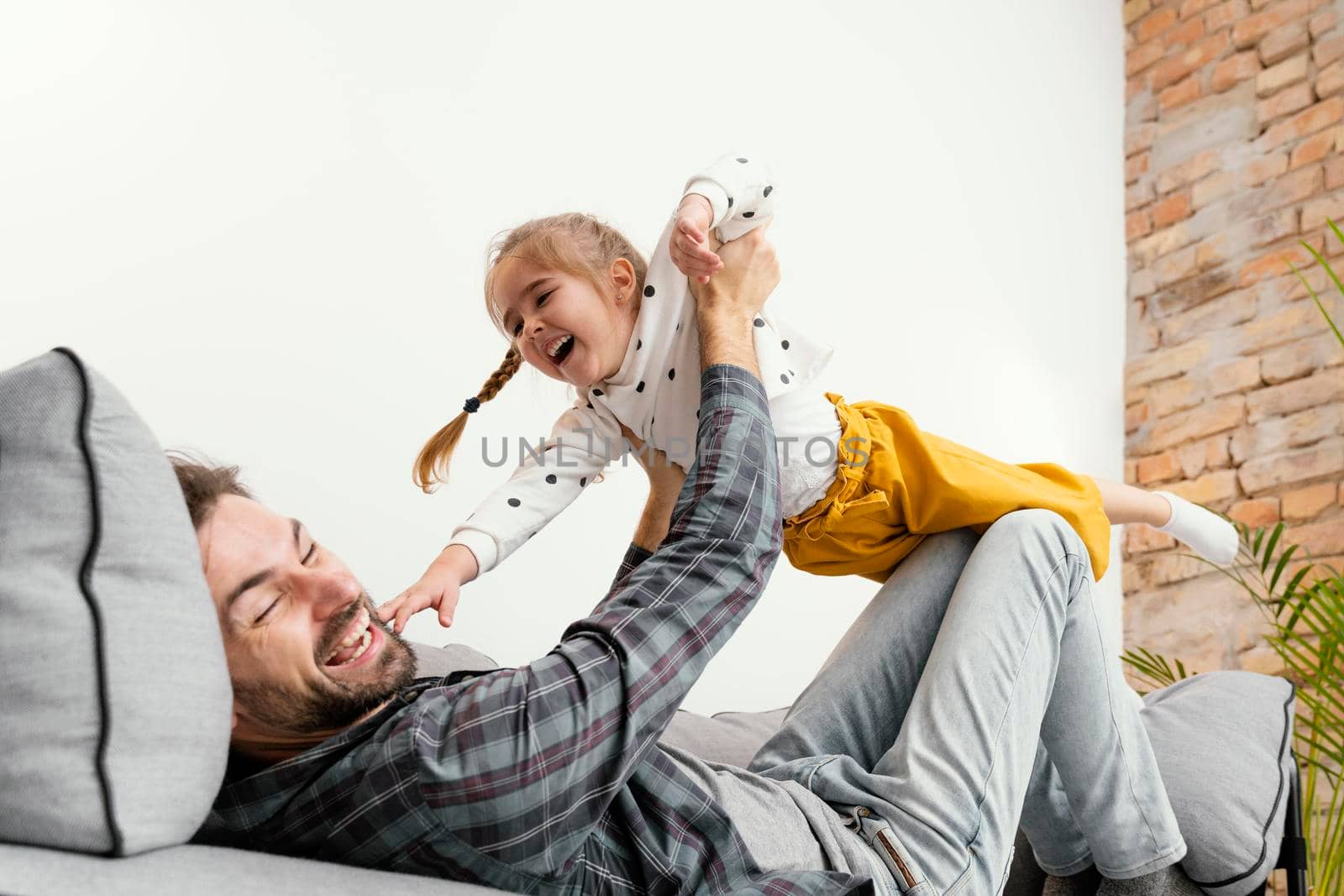 father kid having fun having fun