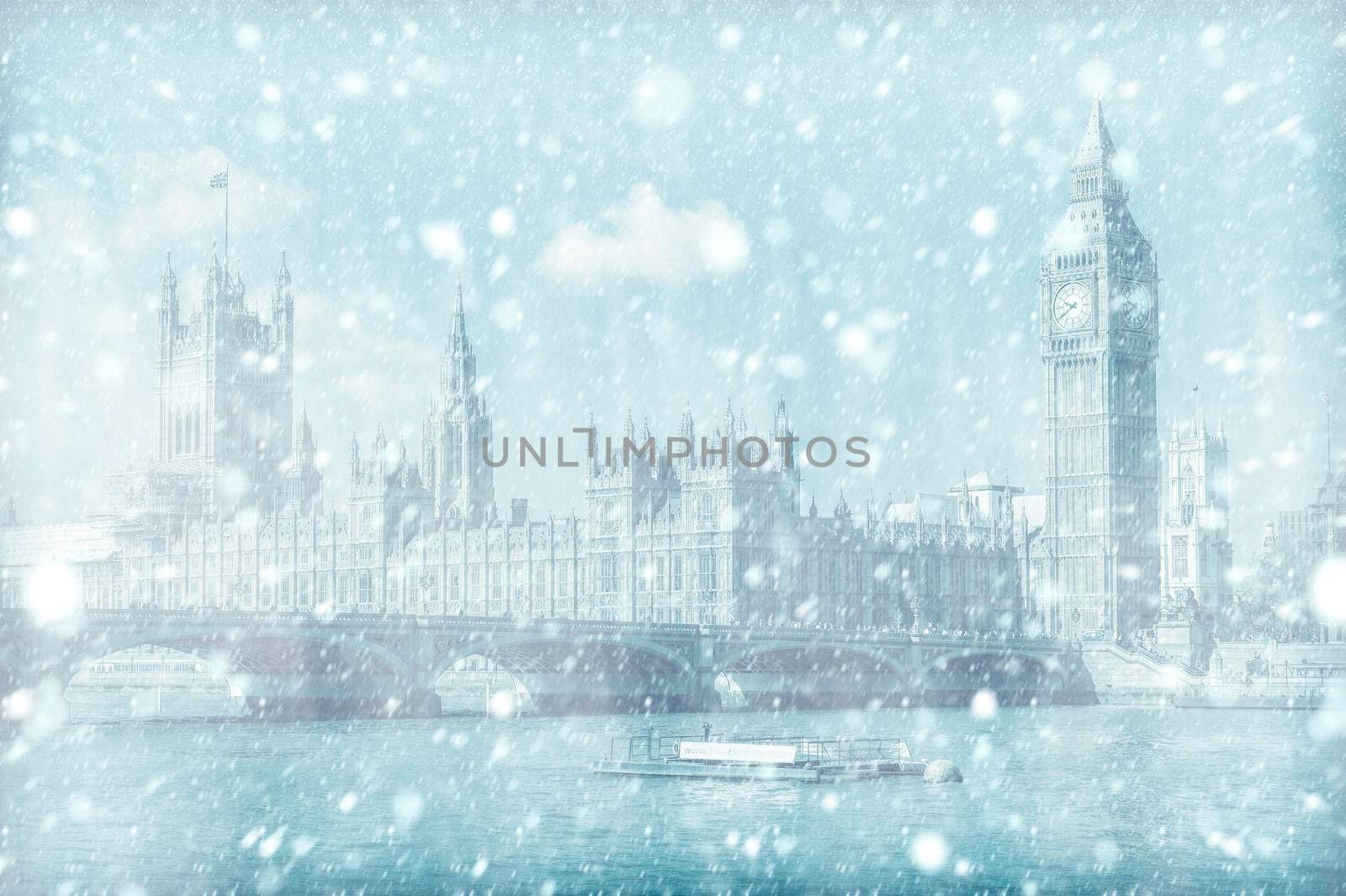 View of Westminster Bridge and House of Parliament in London with snow